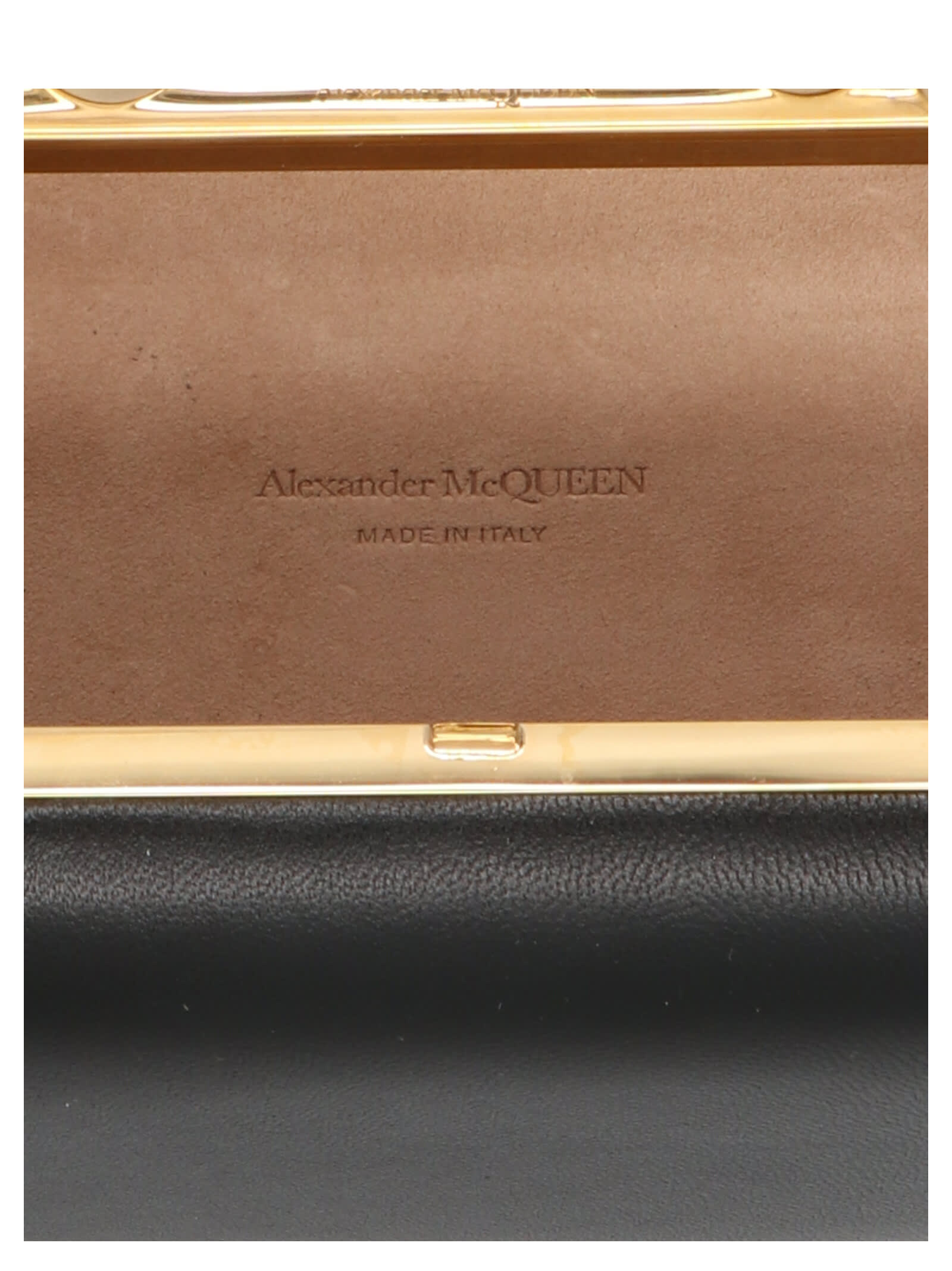 Shop Alexander Mcqueen Skull Four Ring Clutch In Black