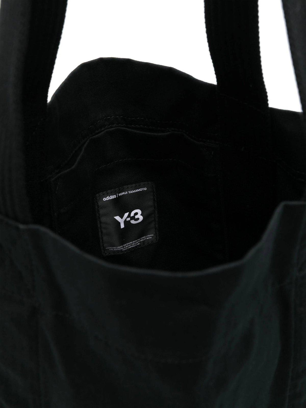 Y-3 Logo Printed Top Handle Bag In Black