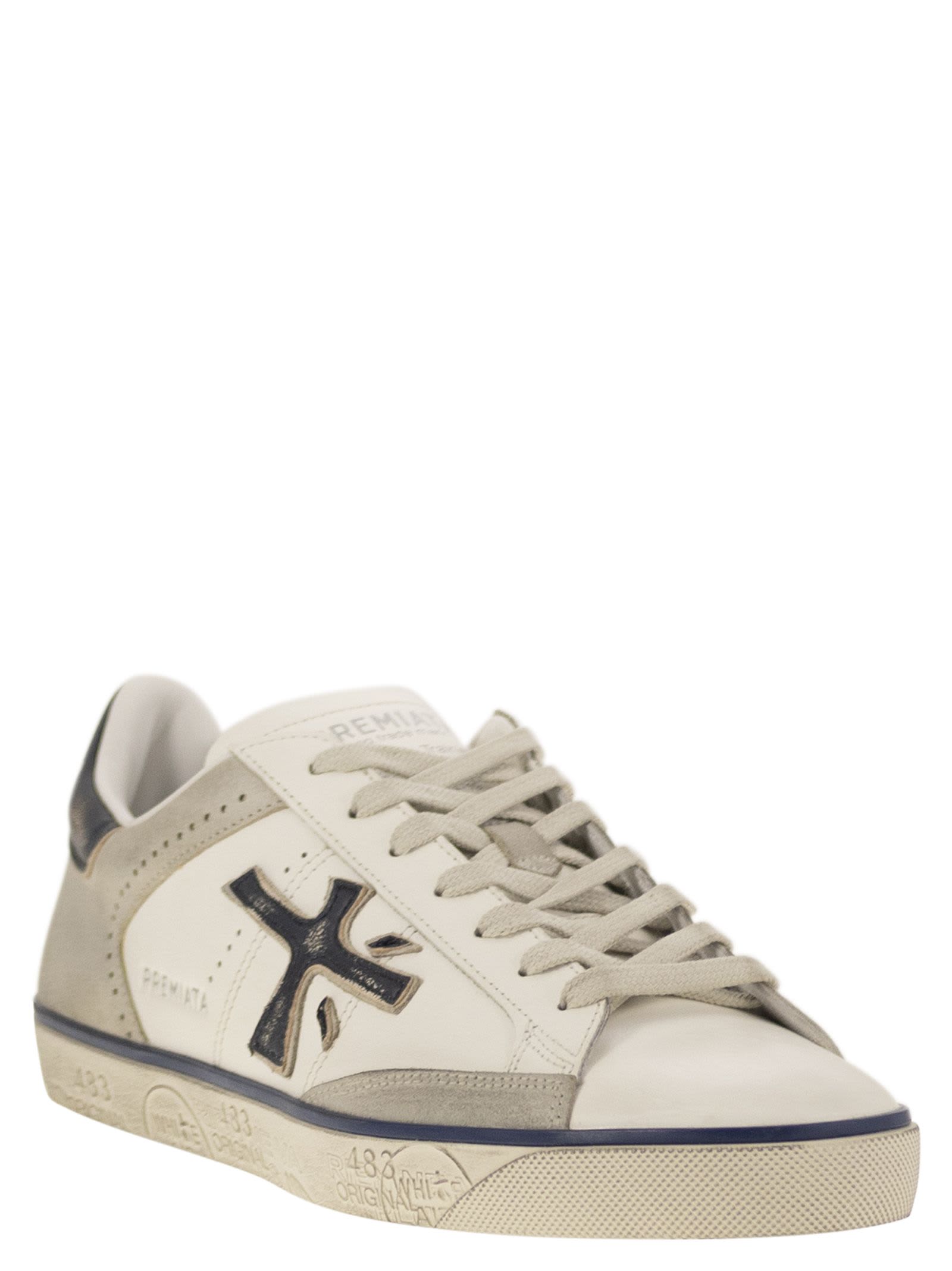 Premiata Steven Sneakers In White/blue