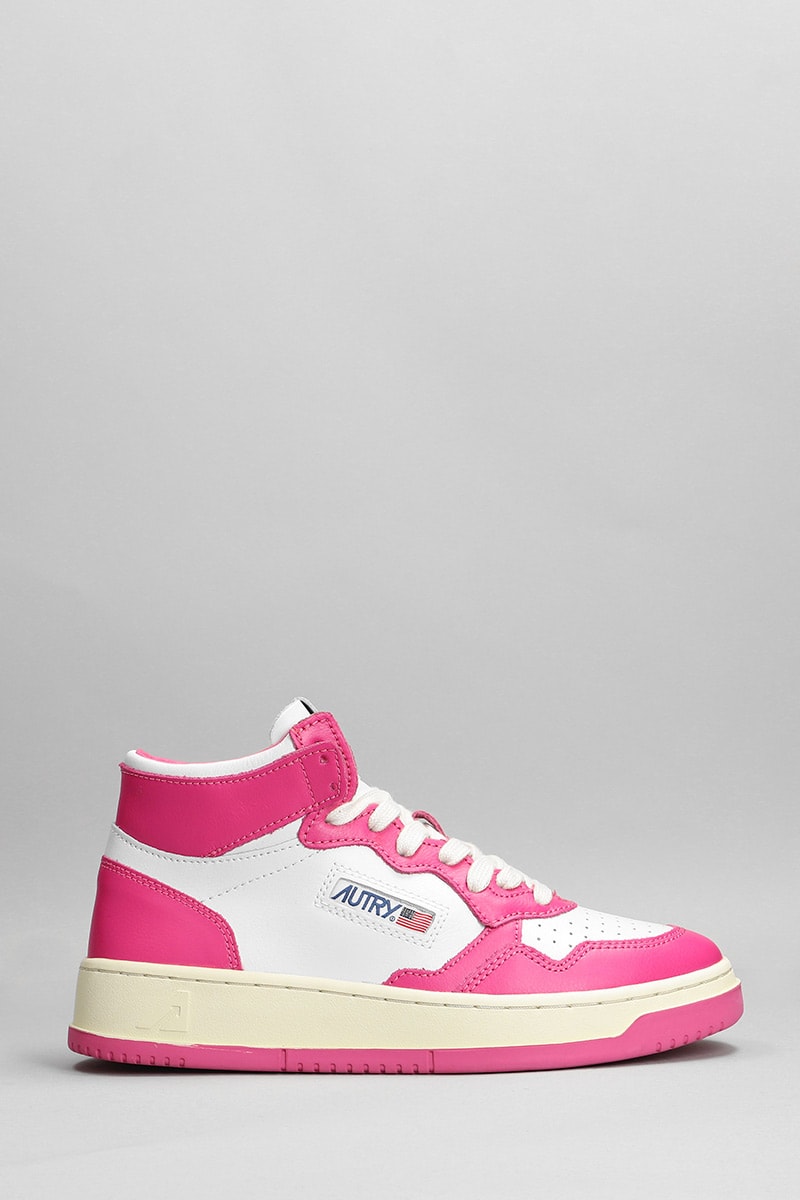 Autry Mid Sneakers In Fuxia Leather