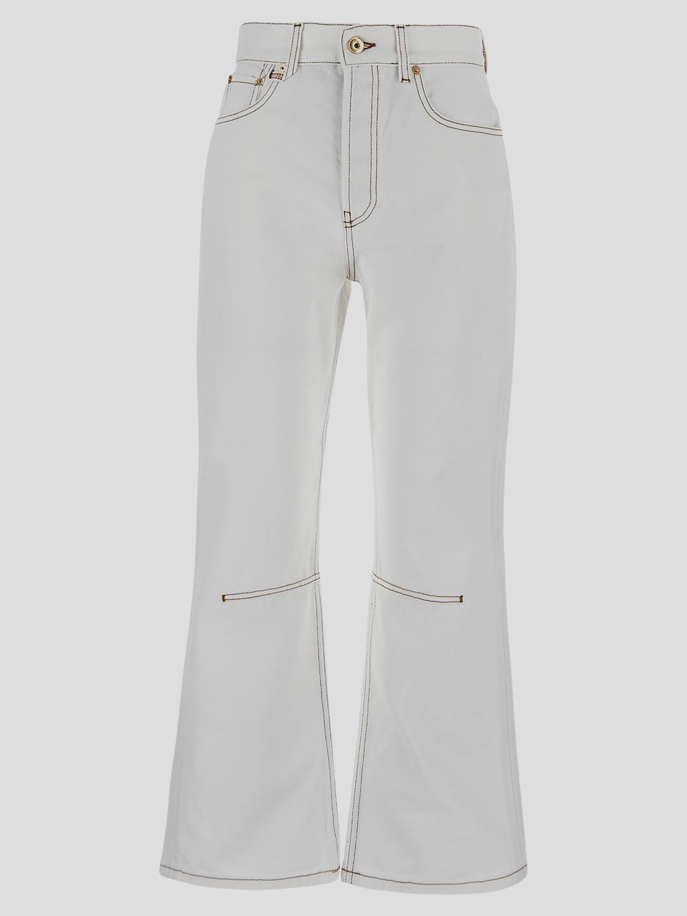 Shop Jacquemus Cropped Flared Jeans In Off-white