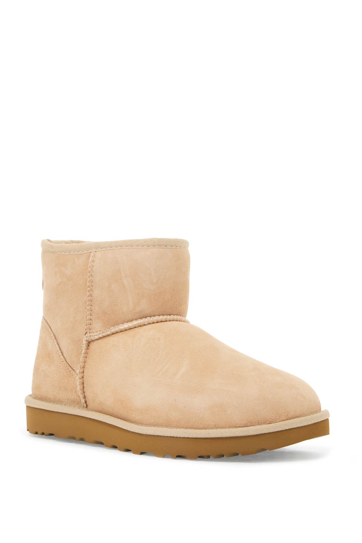 Shop Ugg Classic Mini Ii Ankle Boots In Sand