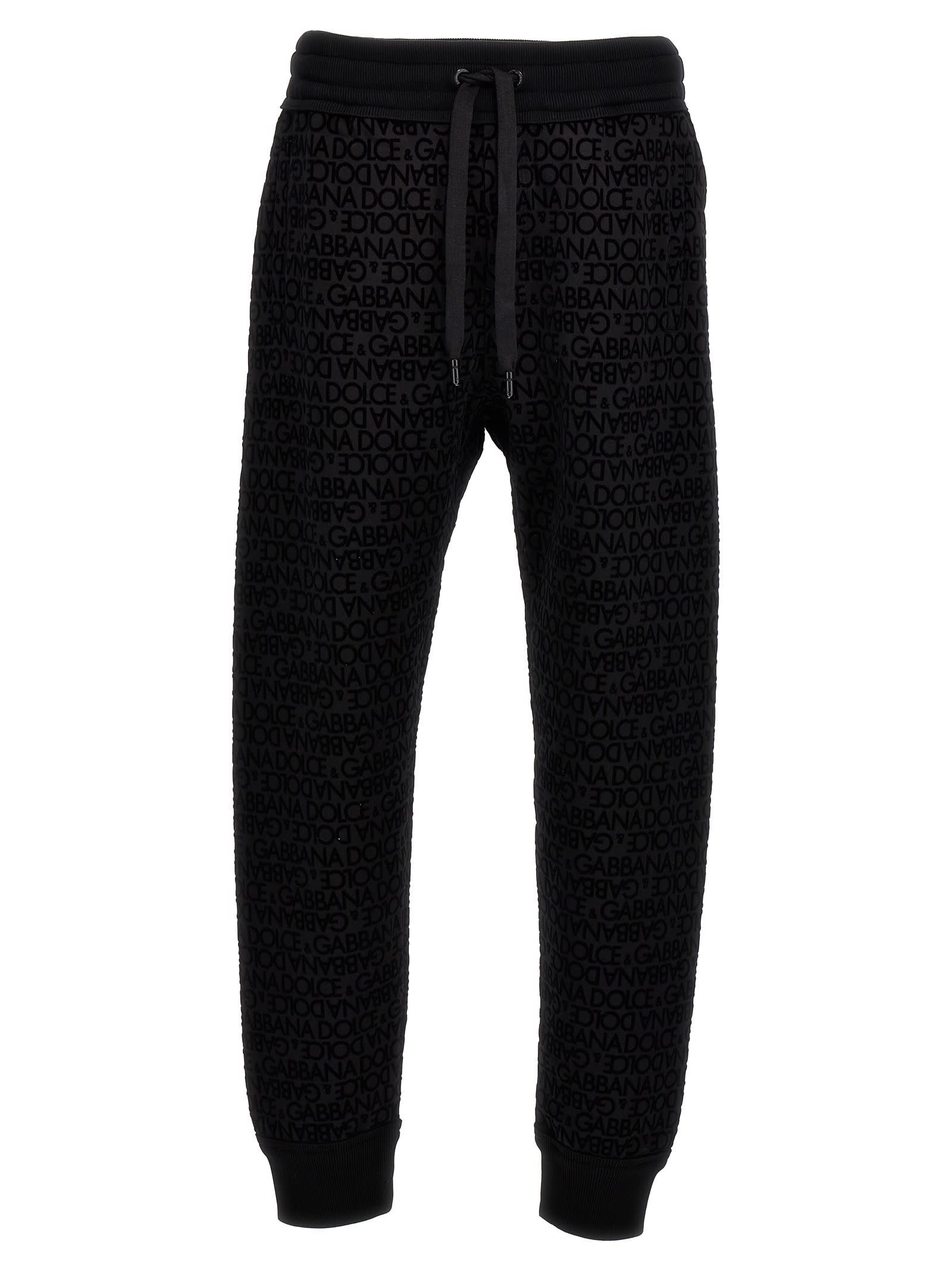Dolce & Gabbana Flocked Logo Joggers In Black