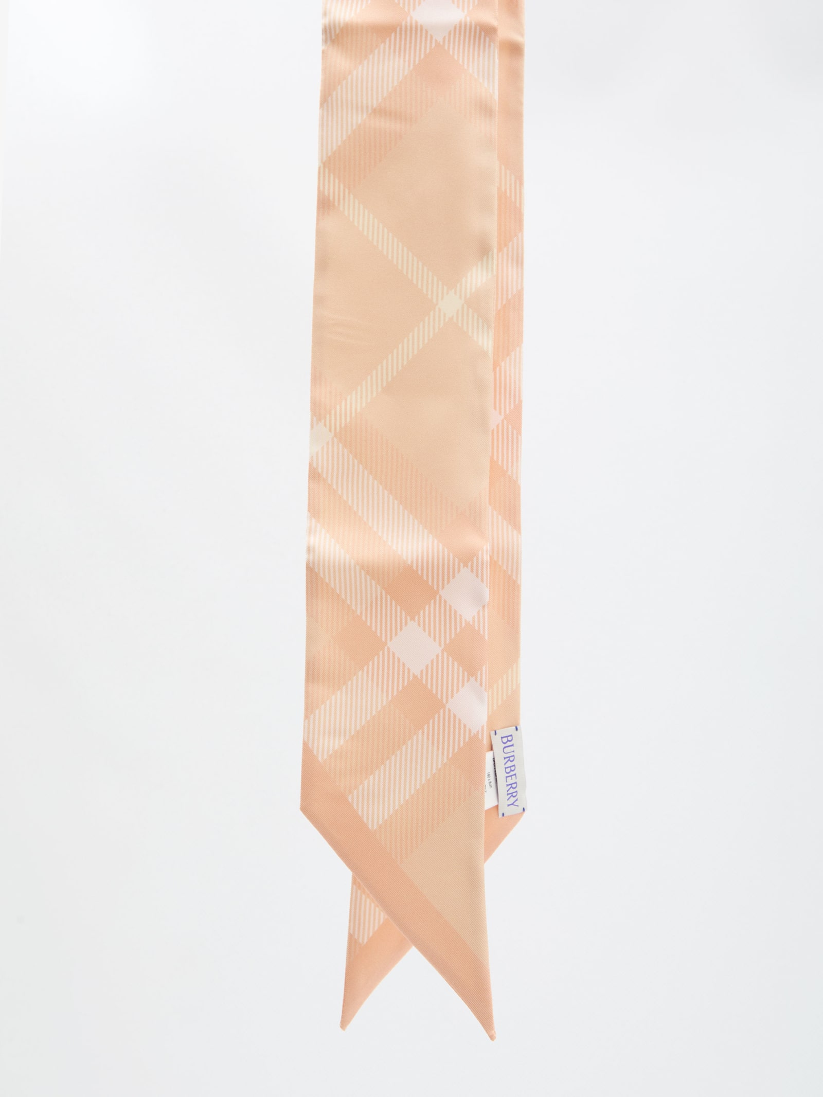 Shop Burberry Skinny Check Scarf In Pink