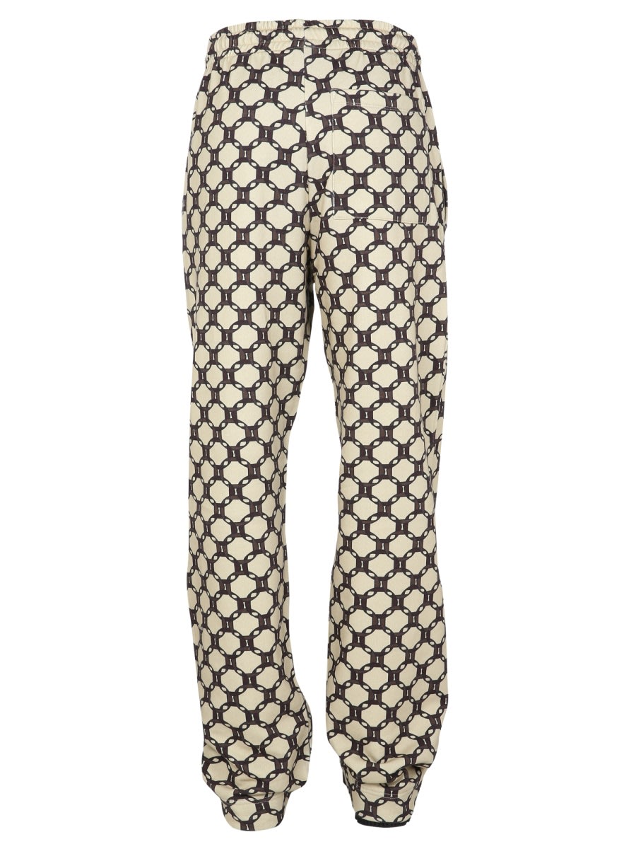 Shop Dries Van Noten Hamer Jogging Trousers In Powder