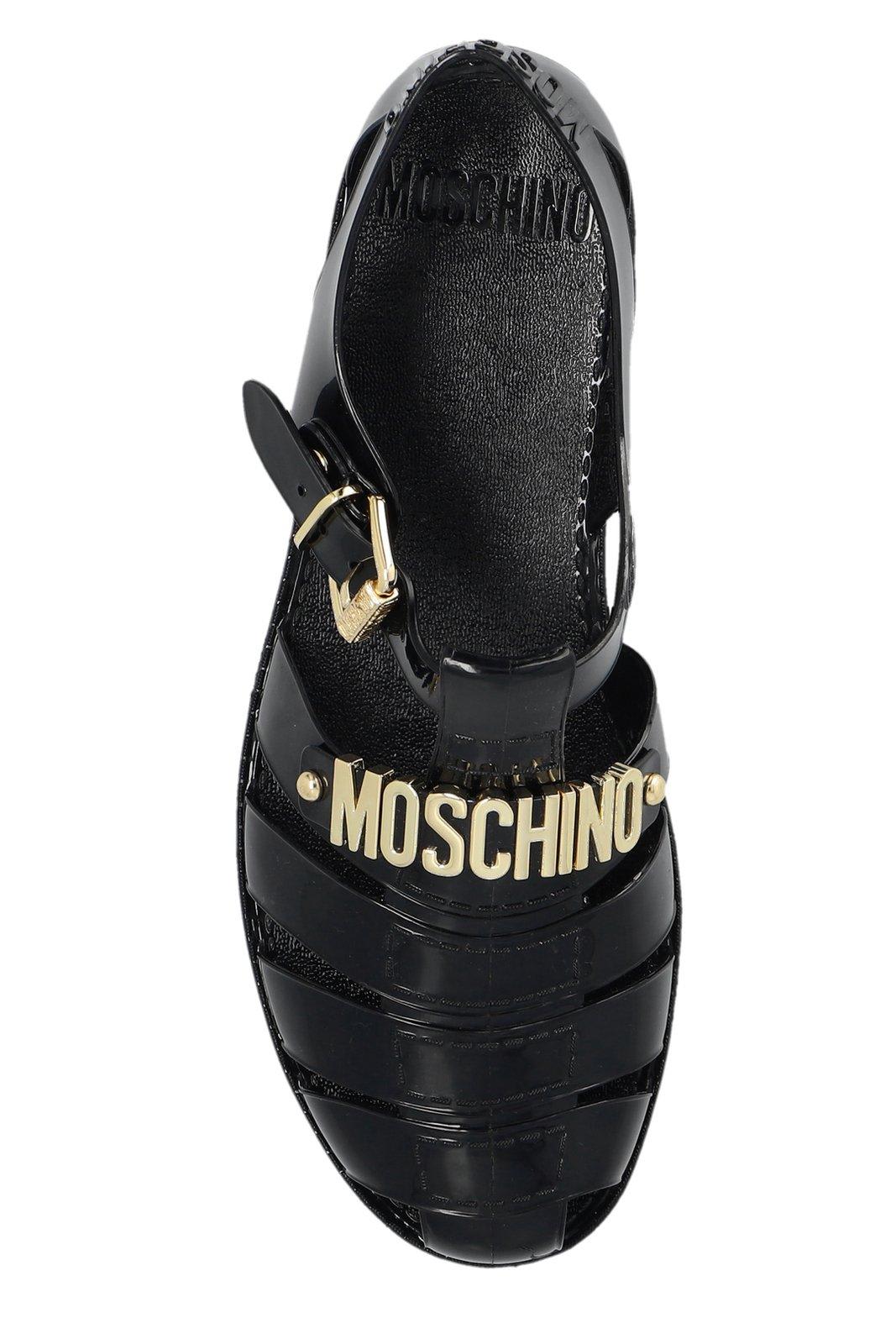 Shop Moschino Logo-plaque Buckle-fastened Jelly Sandals In Black