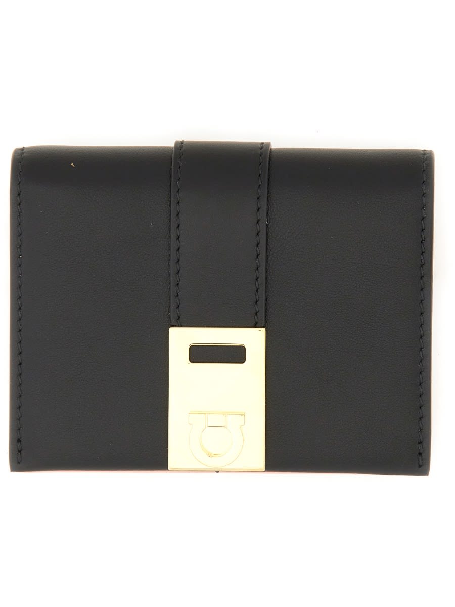 Shop Ferragamo Compact Hug Bicolor Wallet In Black