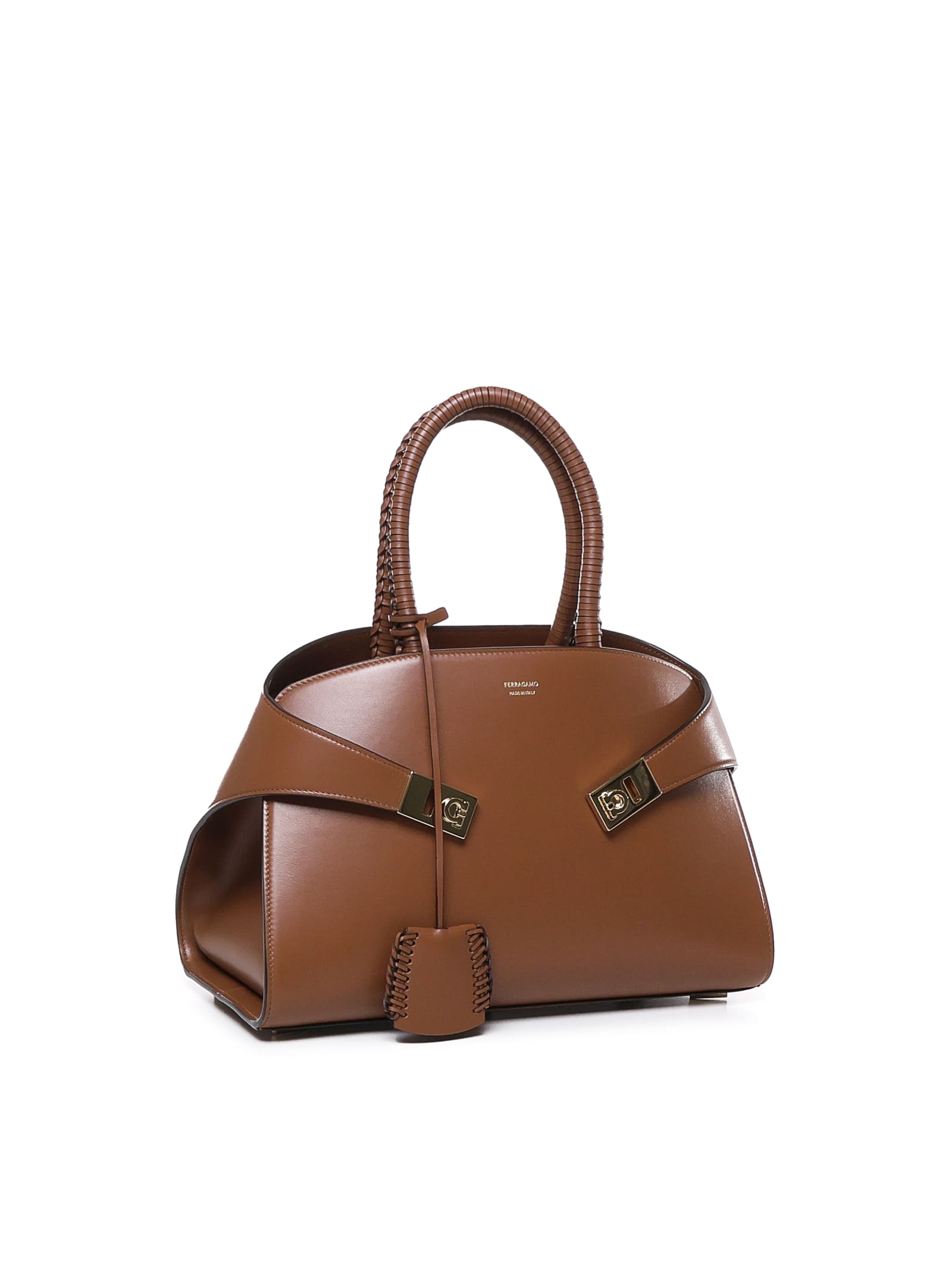 Shop Ferragamo Hug Handbag (s) In Brown