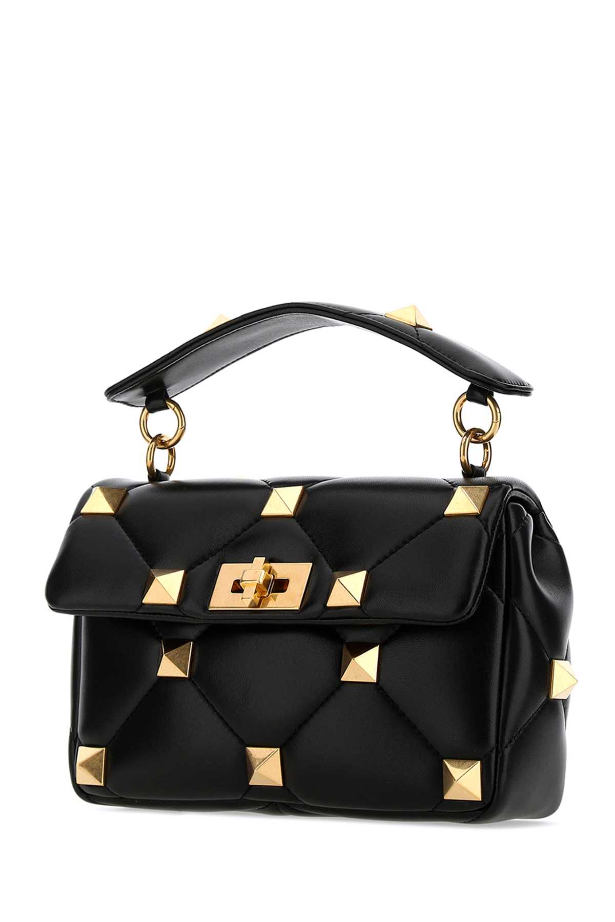 Shop Valentino Black Nappa Leather Medium Roman Stud Handbag In 0no