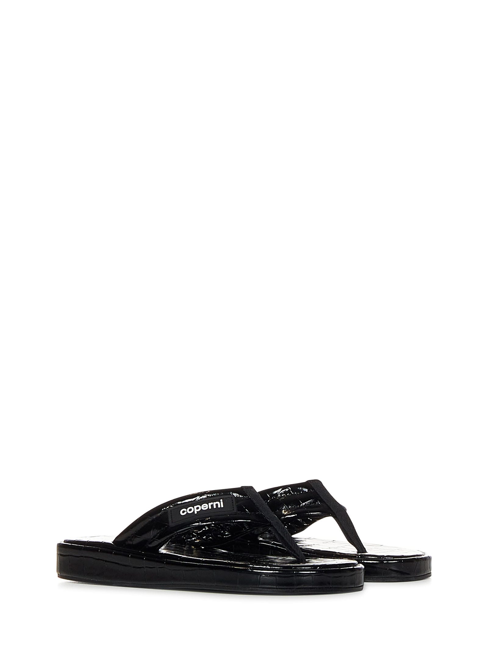 Coperni Logo-appliquéd Rubber-trimmed Croc-effect Patent Leather Flip Flops In Black