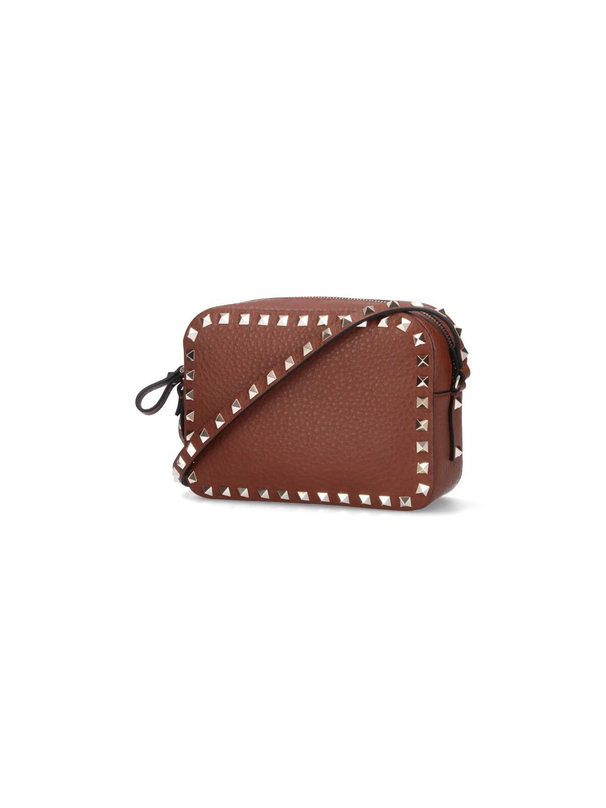 Shop Valentino Rockstud Mini Bag In Brown