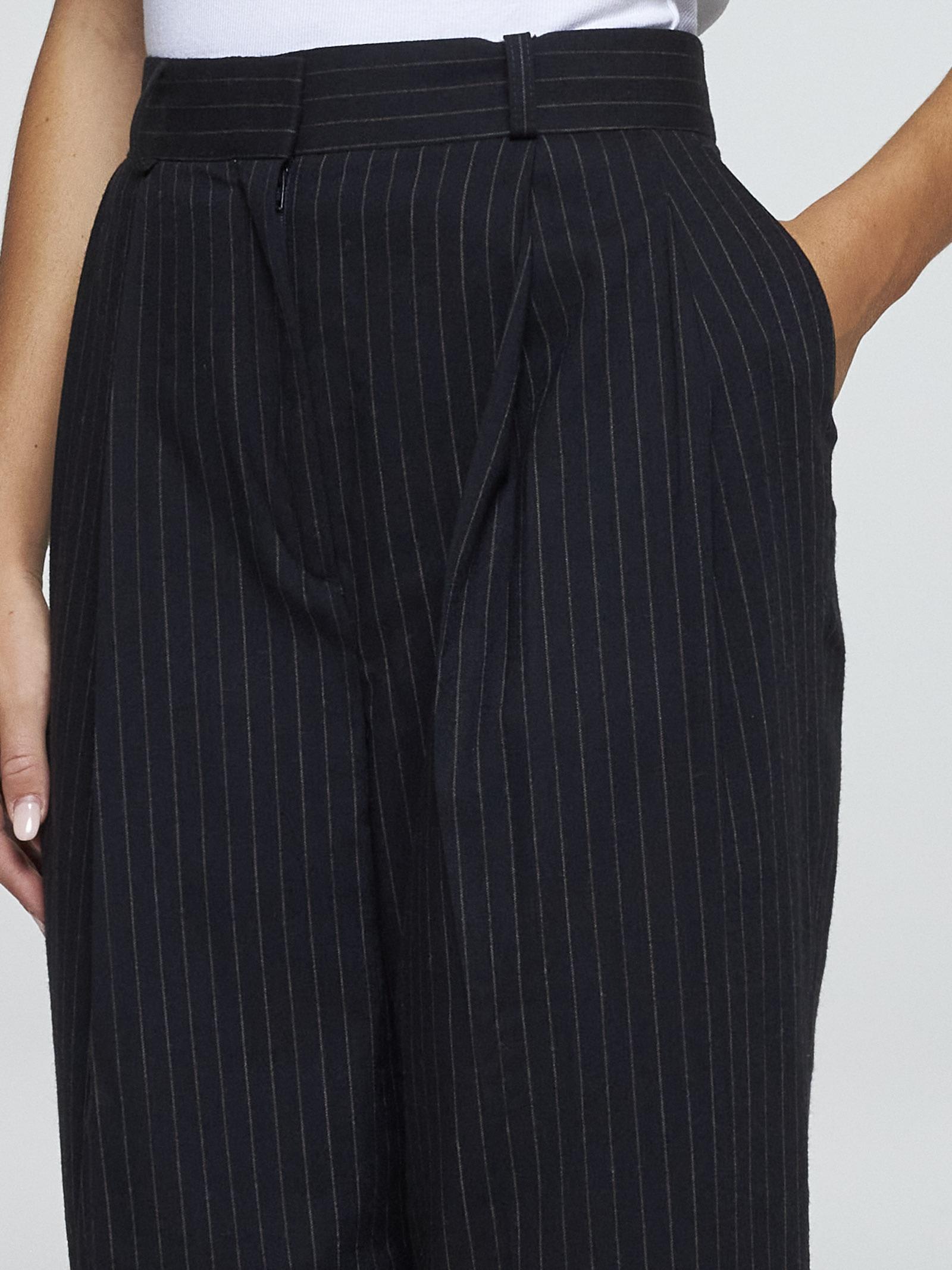 Shop Totême Pinstriped Wool-blend Trousers In Blue