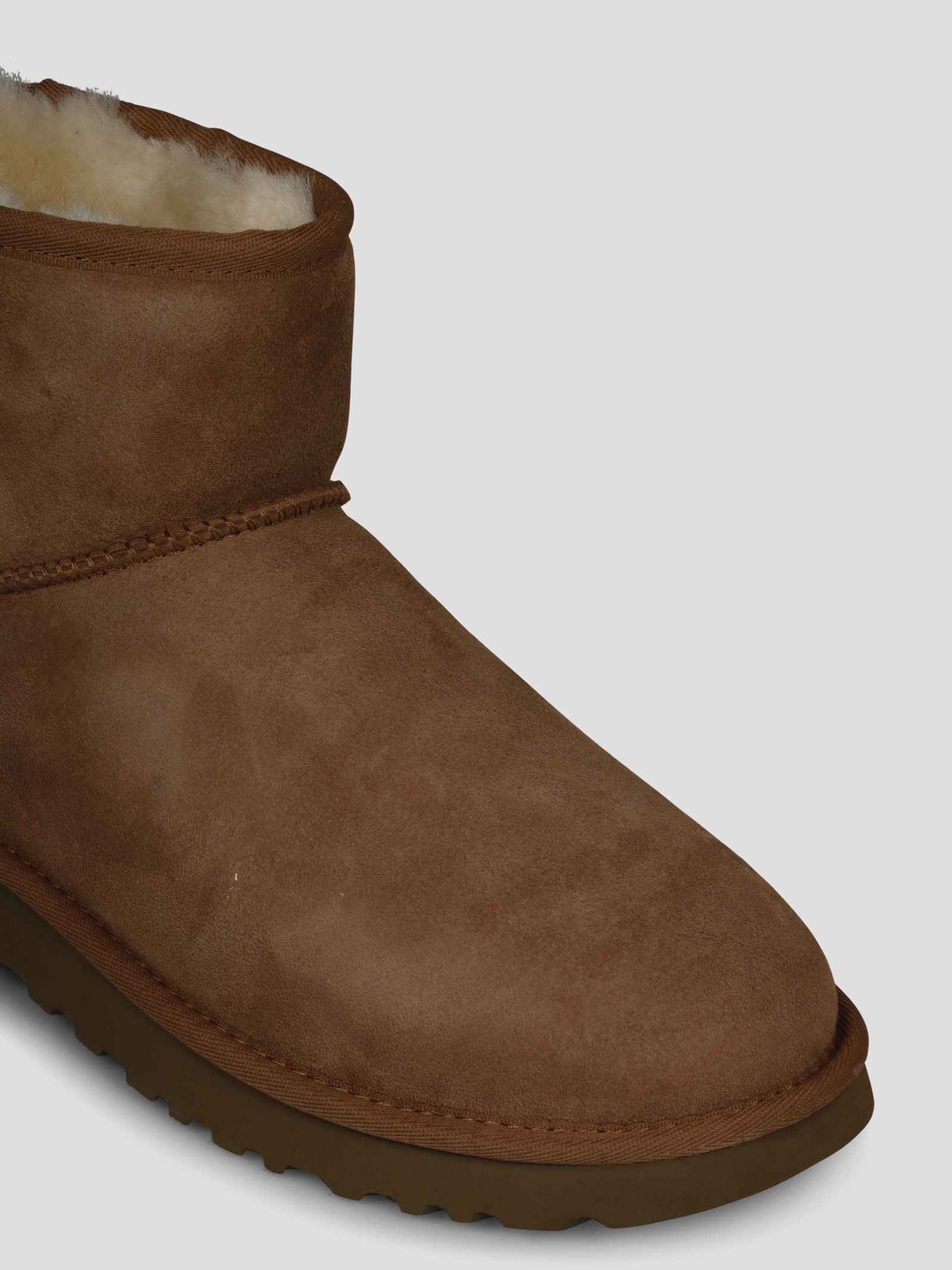 Shop Ugg Classic Mini Ii Boots In Brown