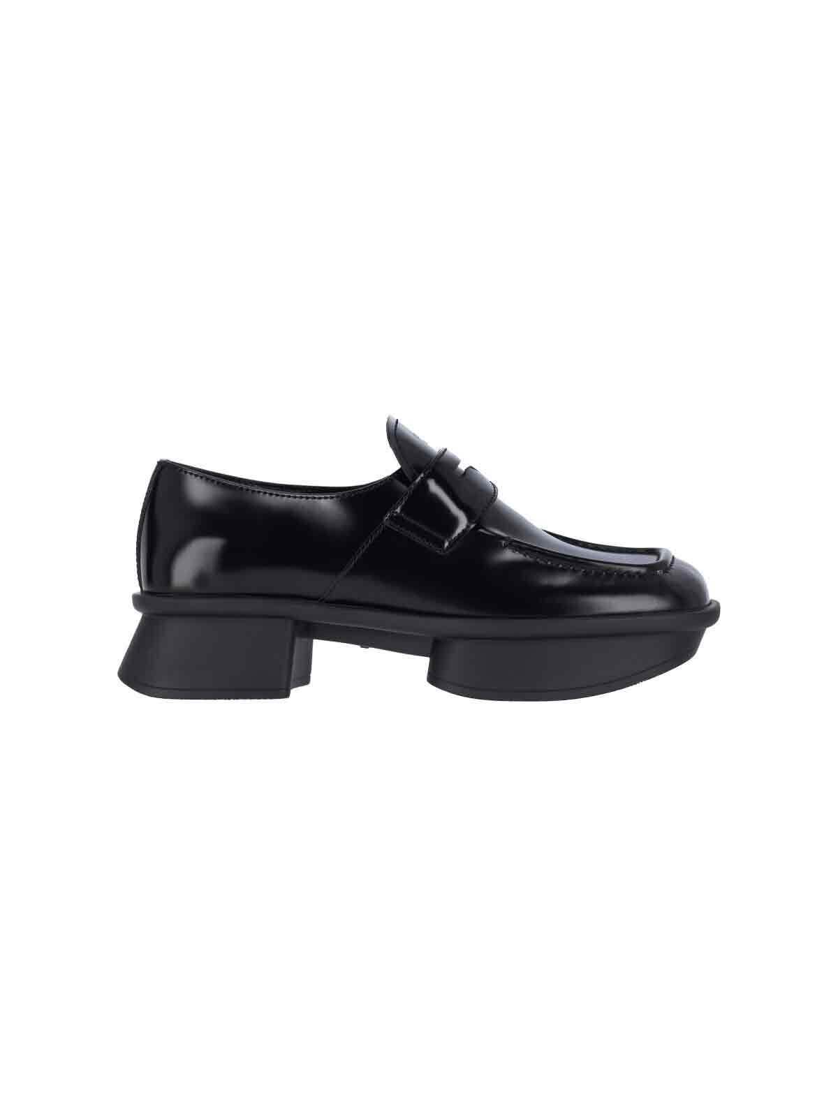 Prada Brushed Leather Squared-toe Loafers In Black