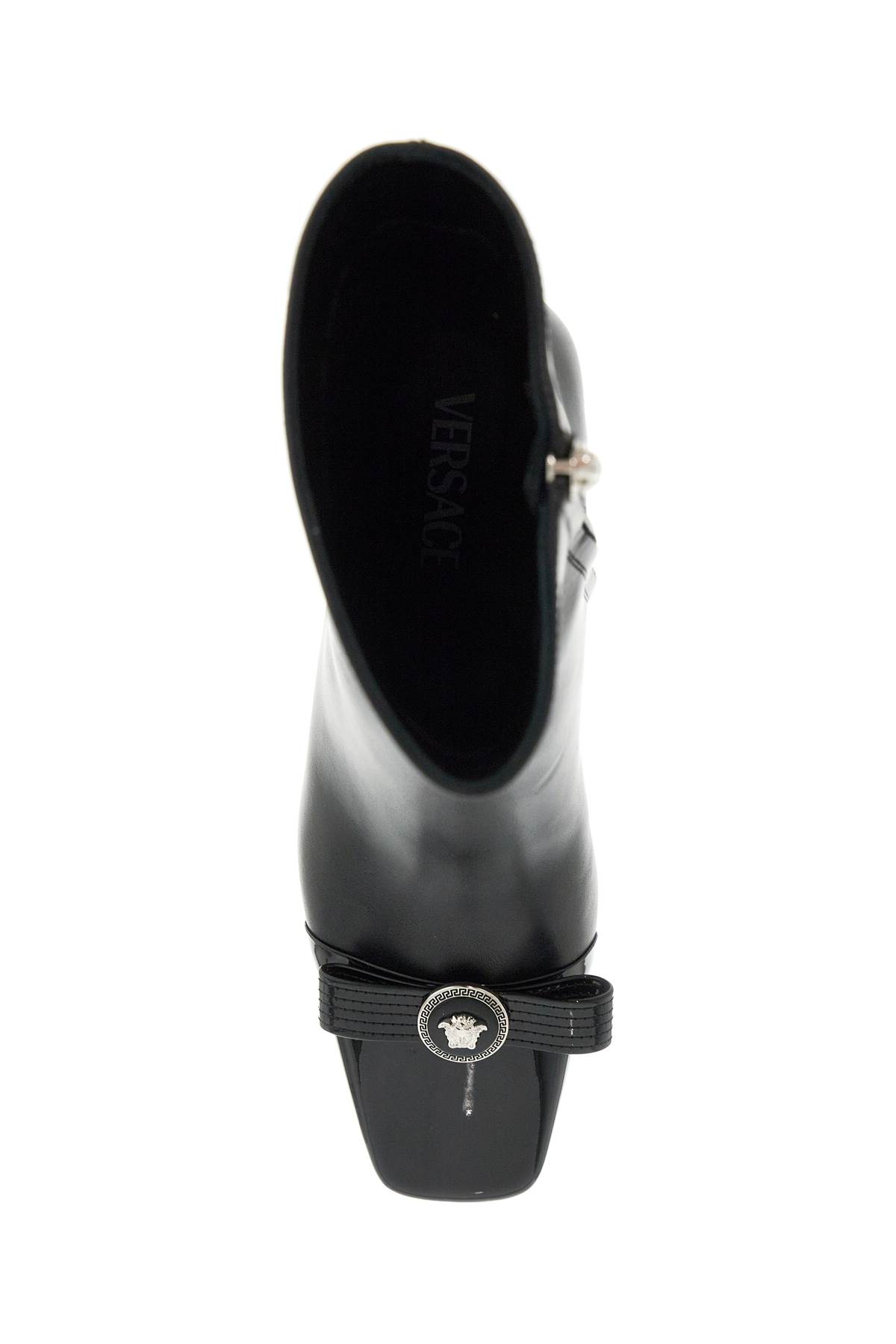 Shop Versace Gianni Ribbon Leather Ankle Boots With In Black-palladium (black)