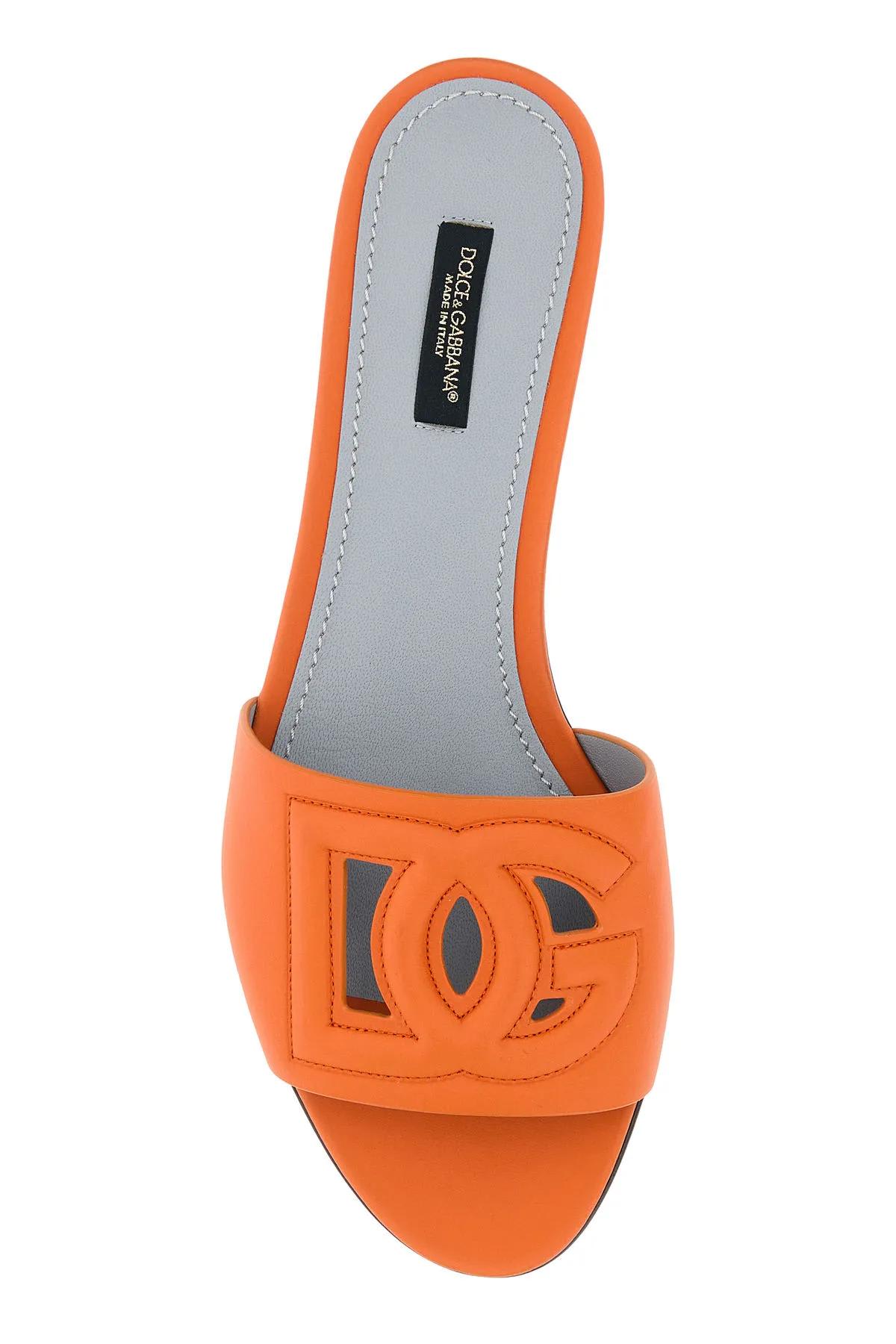 Shop Dolce & Gabbana Orange Leather Dg Slippers In Arancio