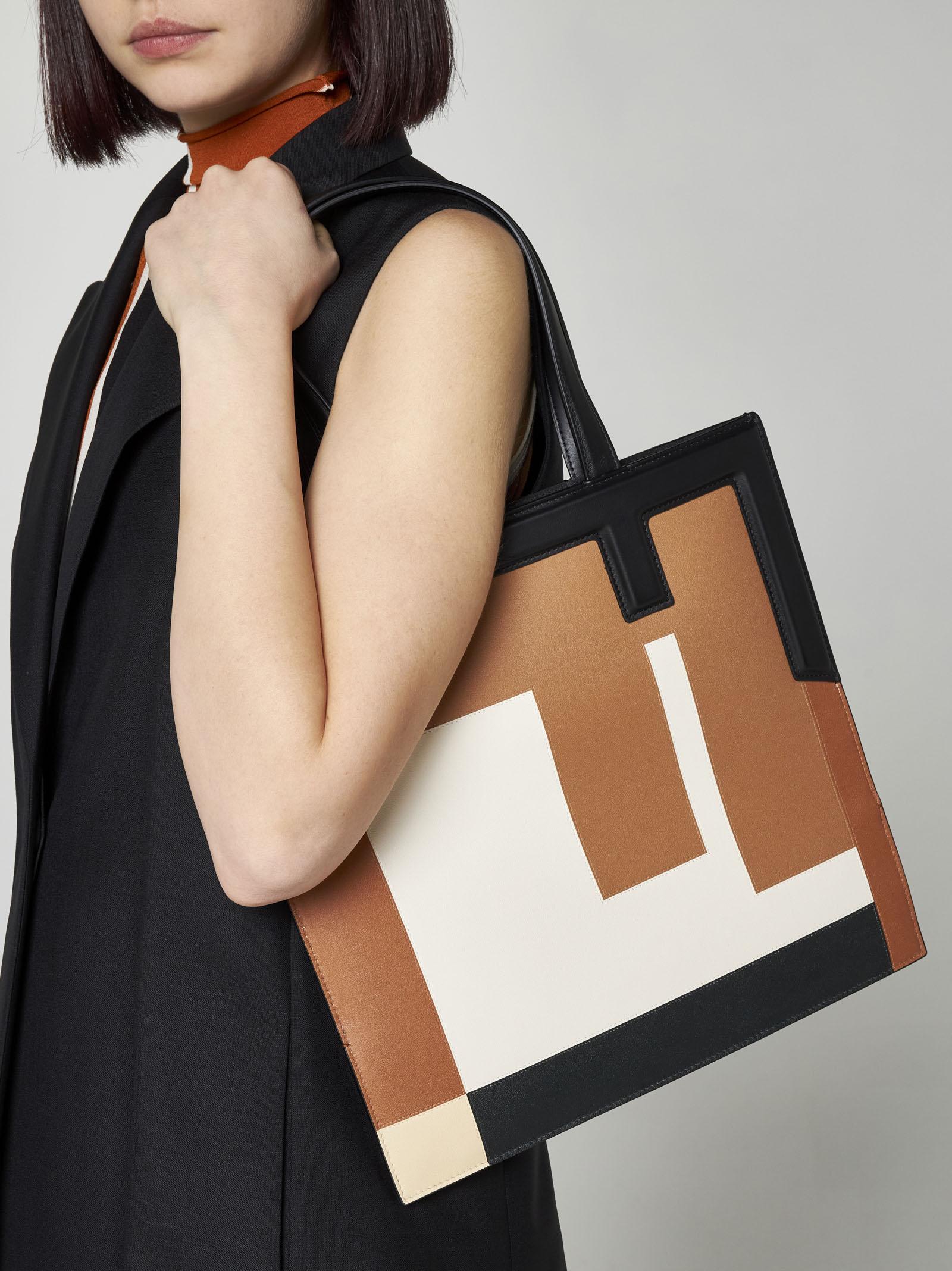 Shop Fendi Flip Medium Ff Puzzle Leather Bag In Nro+brandy+mlc