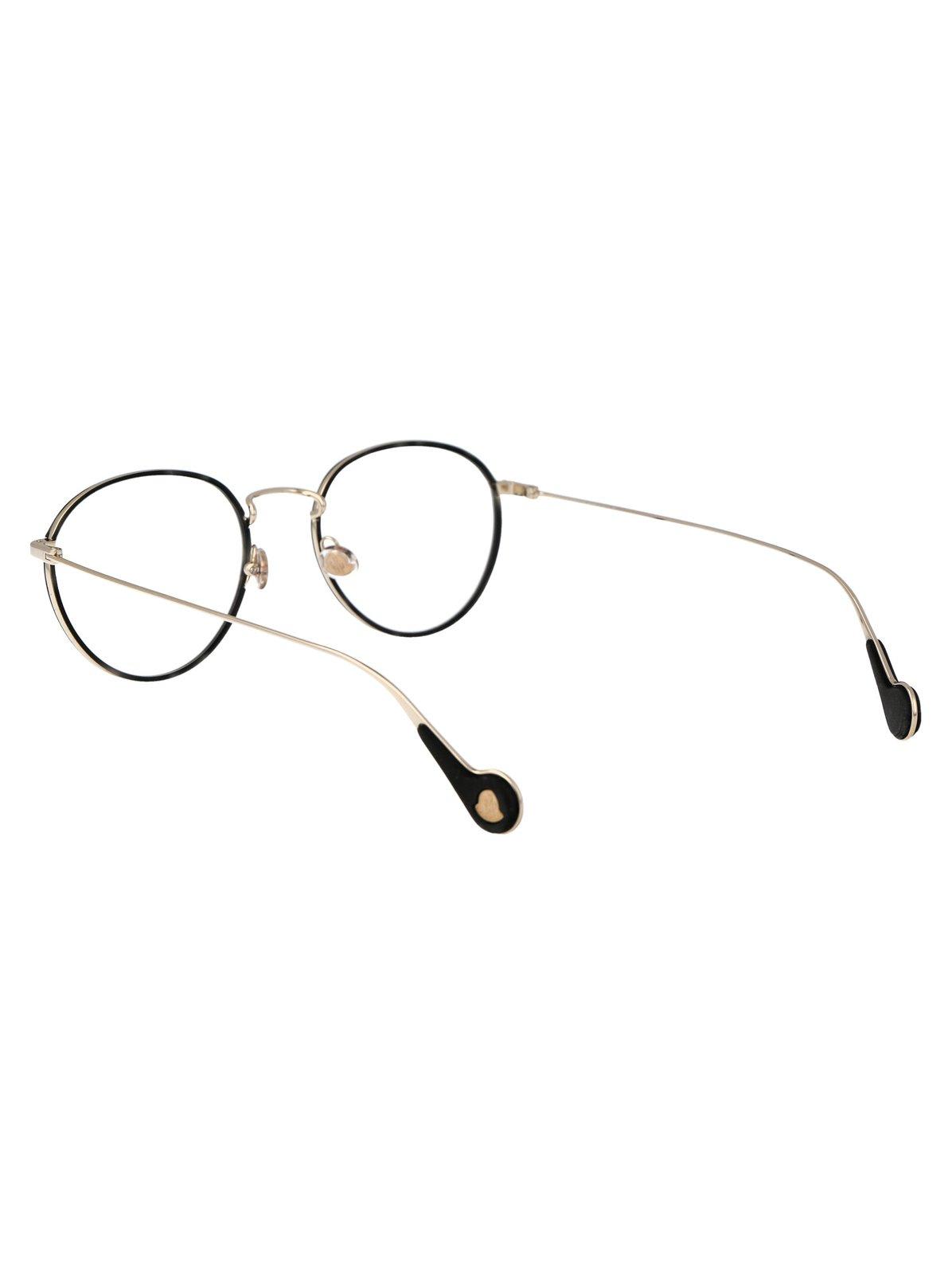 Shop Moncler Oval Frame Glasses In 032