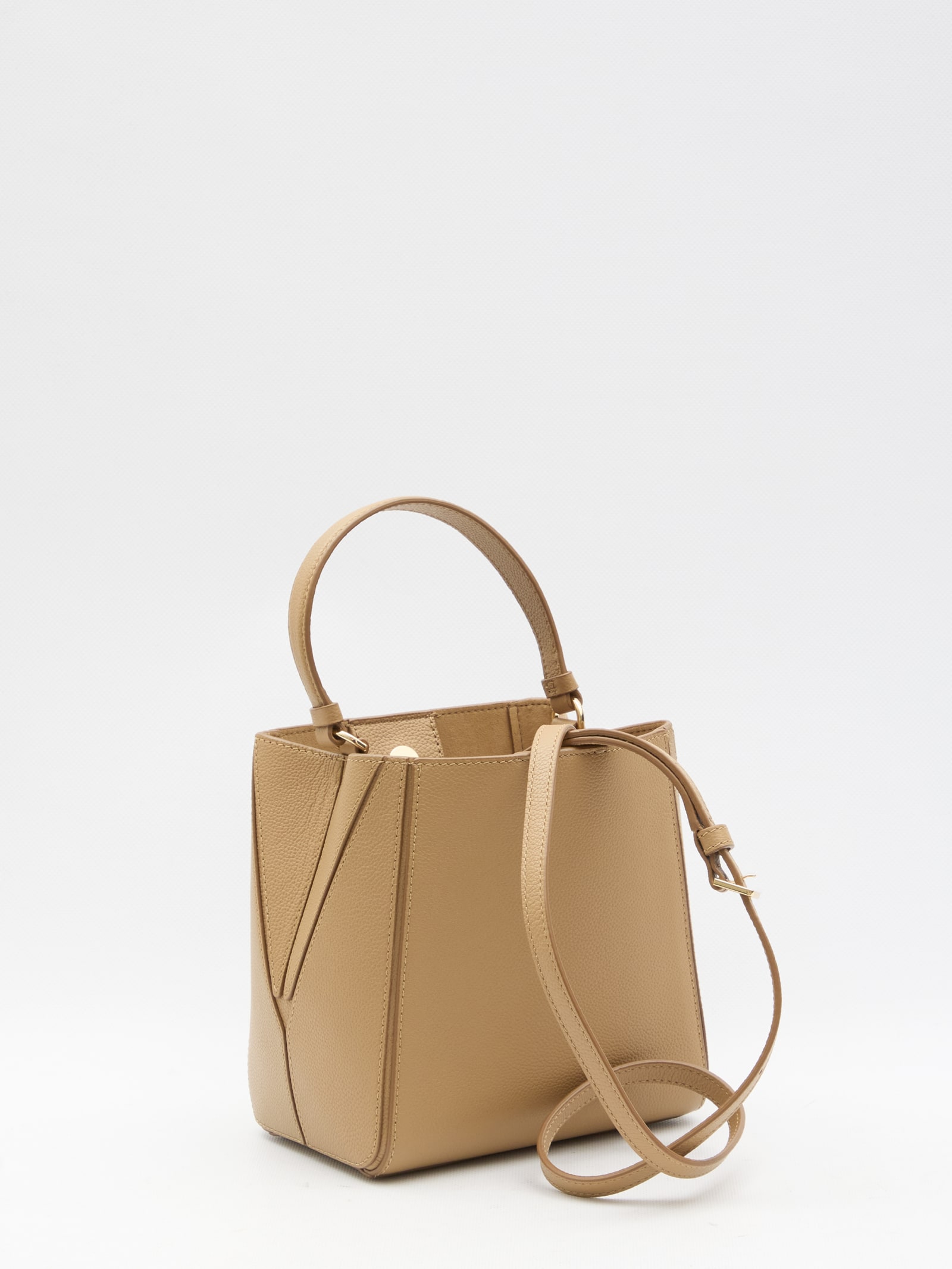 Shop Tory Burch Mcgraw Small Bucket Bag In Beige