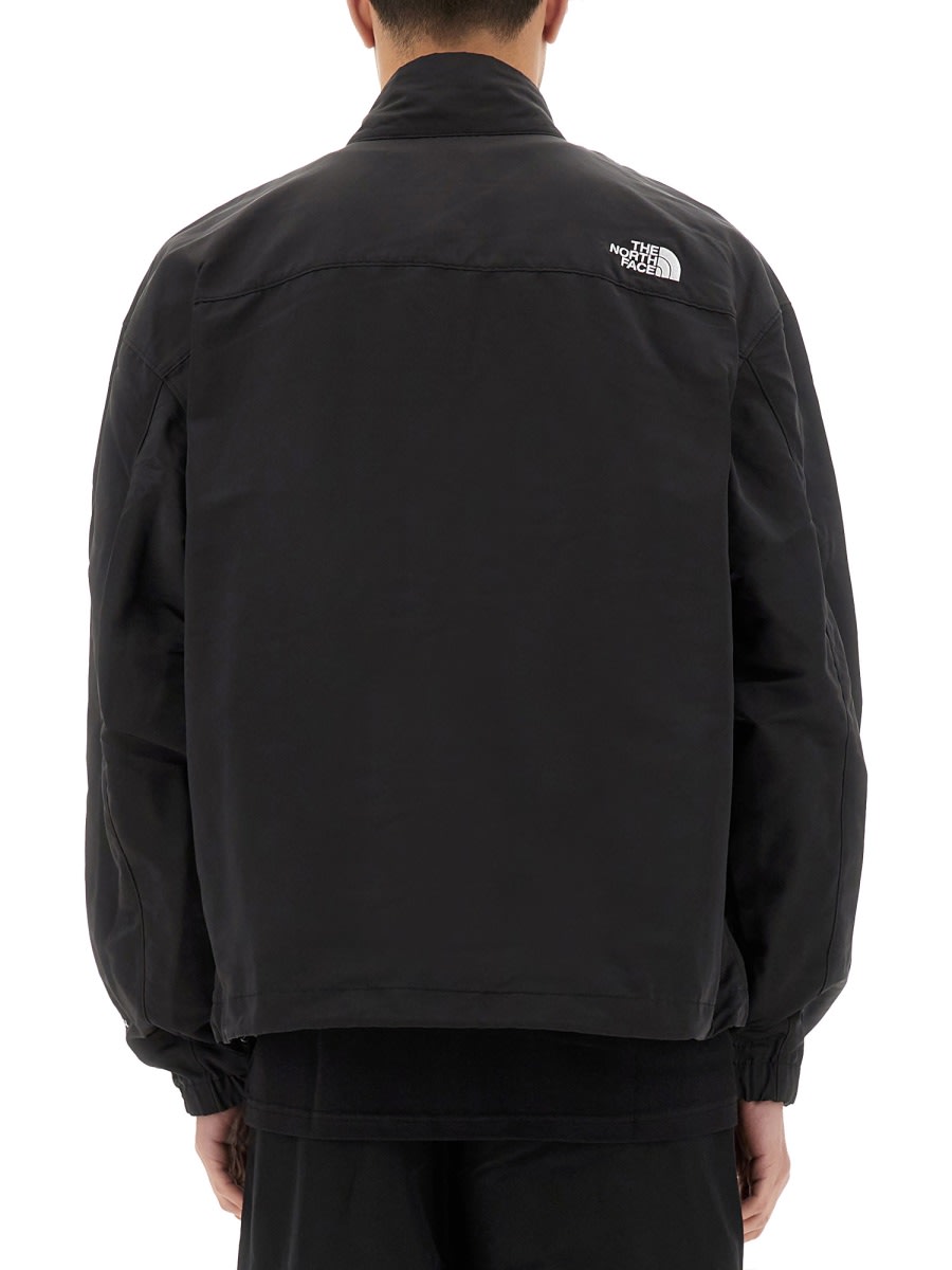 Shop The North Face Tnf Easy Wind Track Jacket In Black