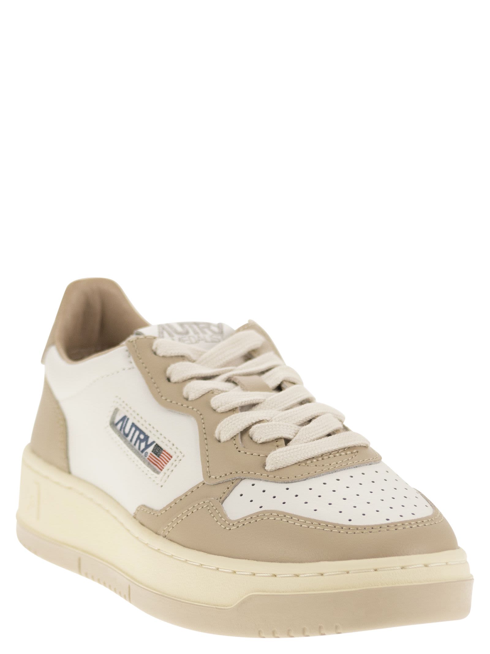 Shop Autry Medalist Low - Two-tone Leather Sneakers In White/beige