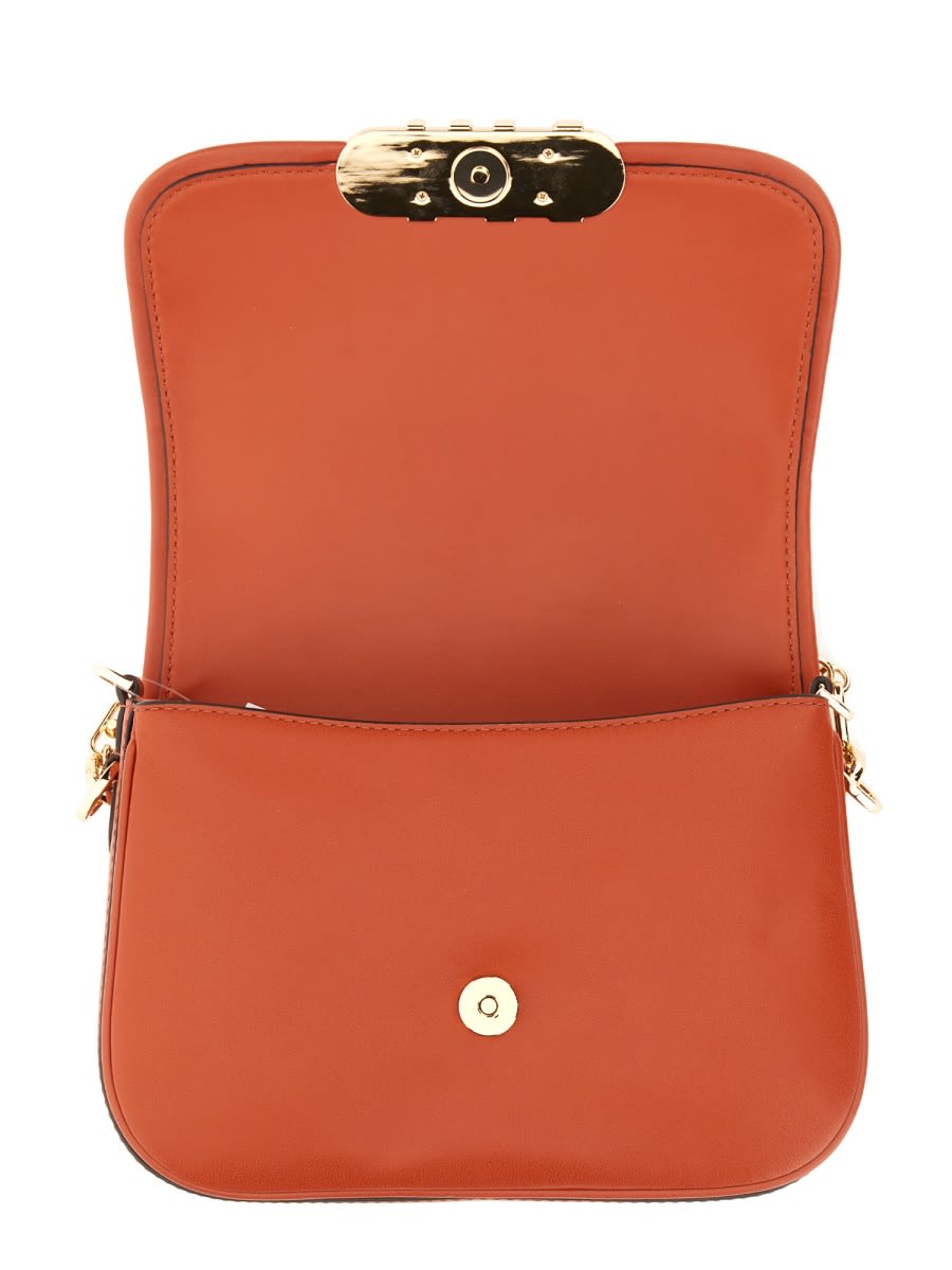 Shop Michael Kors Parker Messenger Bag In Orange