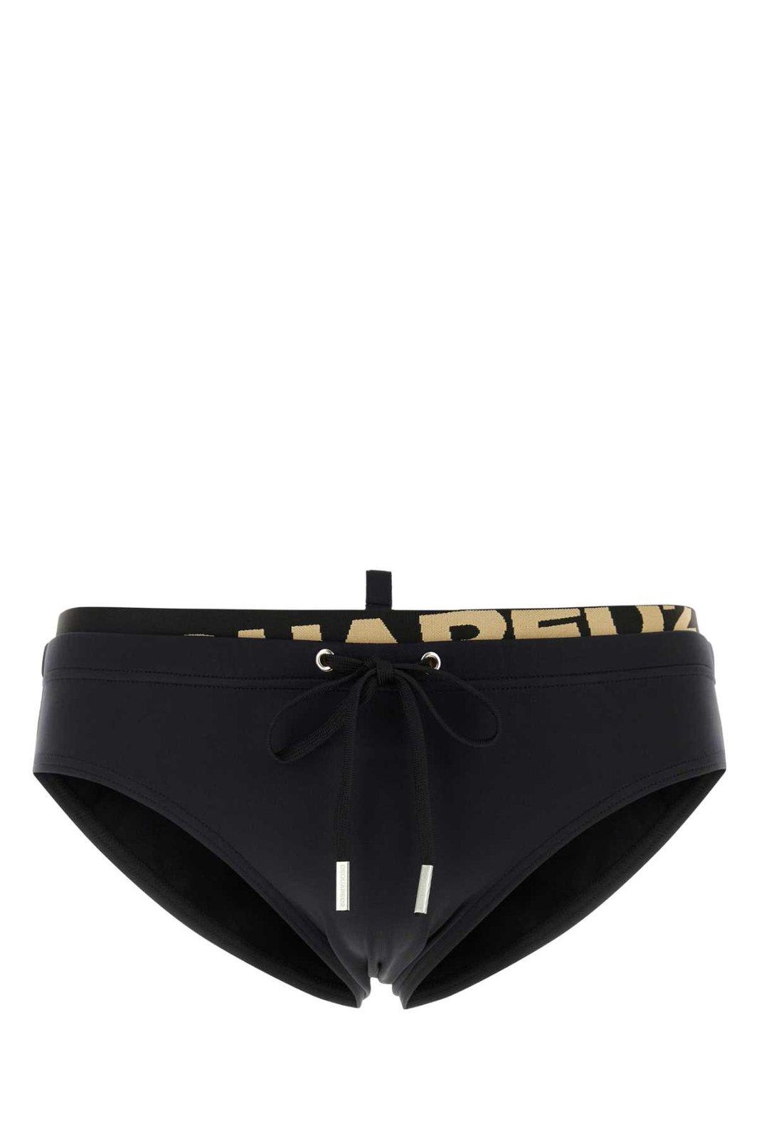 Shop Dsquared2 Logo Printed Stretched Swim Trunks In Nero