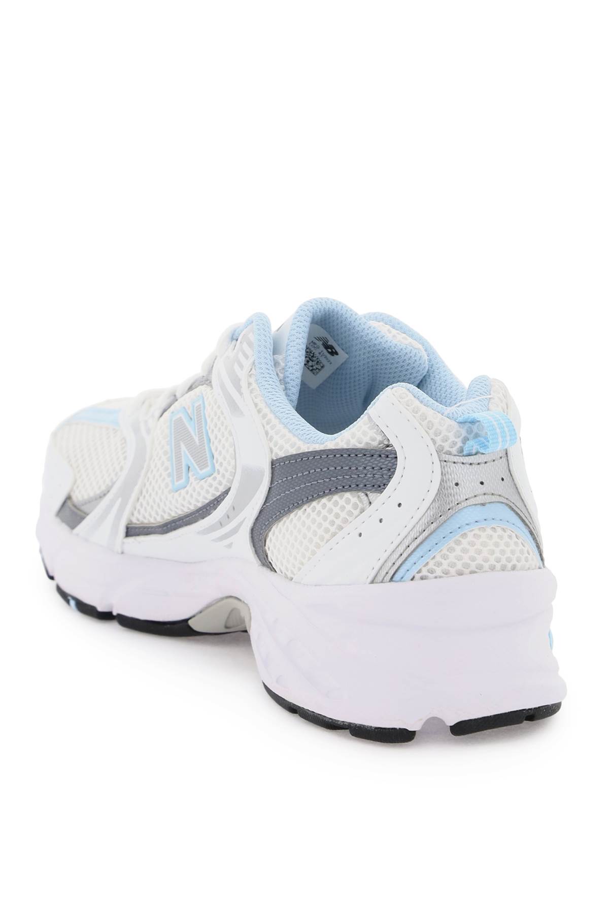 Shop New Balance 530 Sneakers In White Lilac Dark Grey (silver)