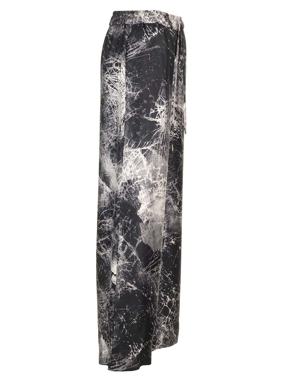 Shop Alexander Mcqueen Smashed Screen Print Trousers In Black