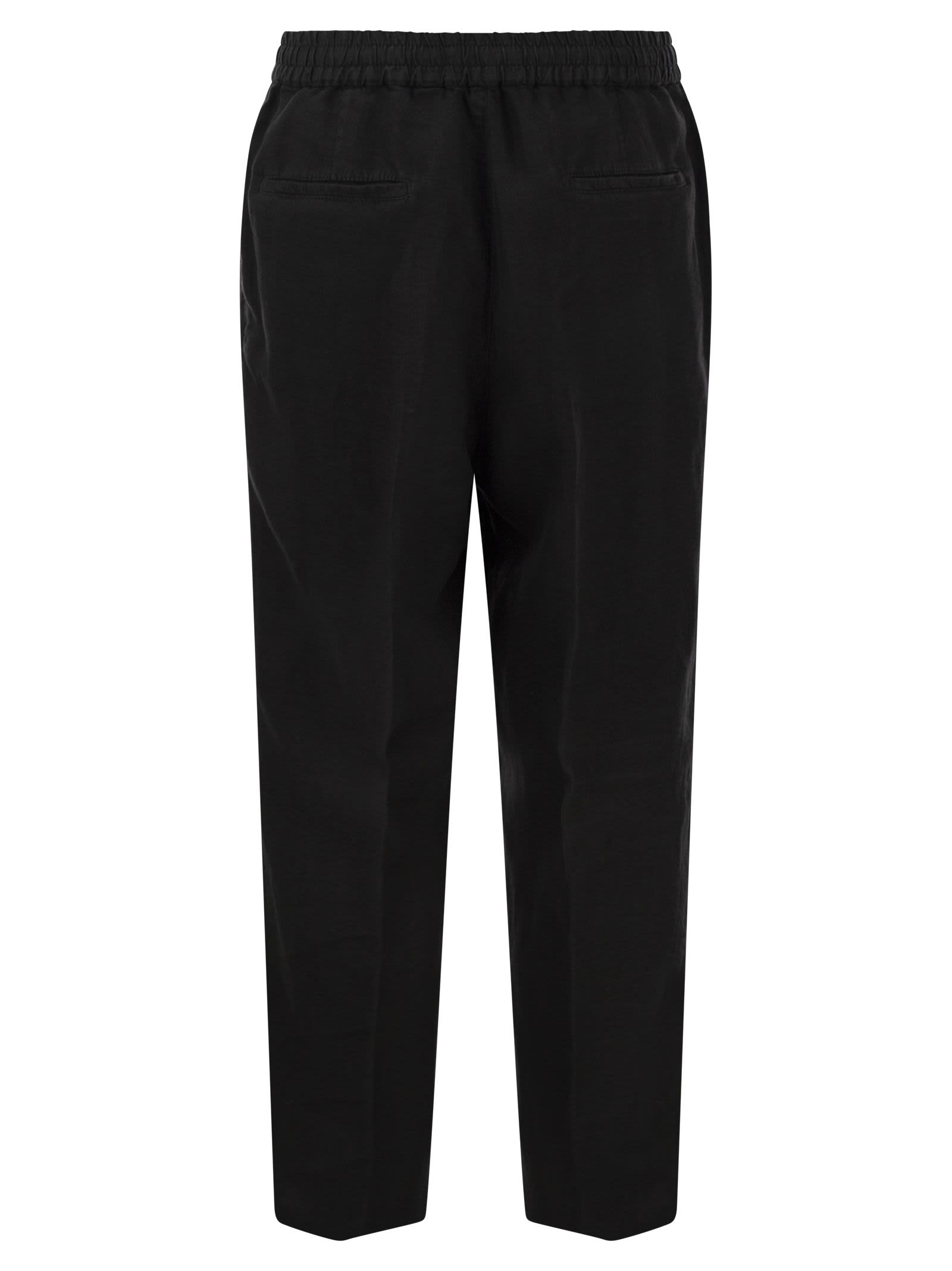 Shop Brunello Cucinelli Leisure Fit Trousers In Garment-dyed Linen Gabardine With Drawstring And Double Darts In Black