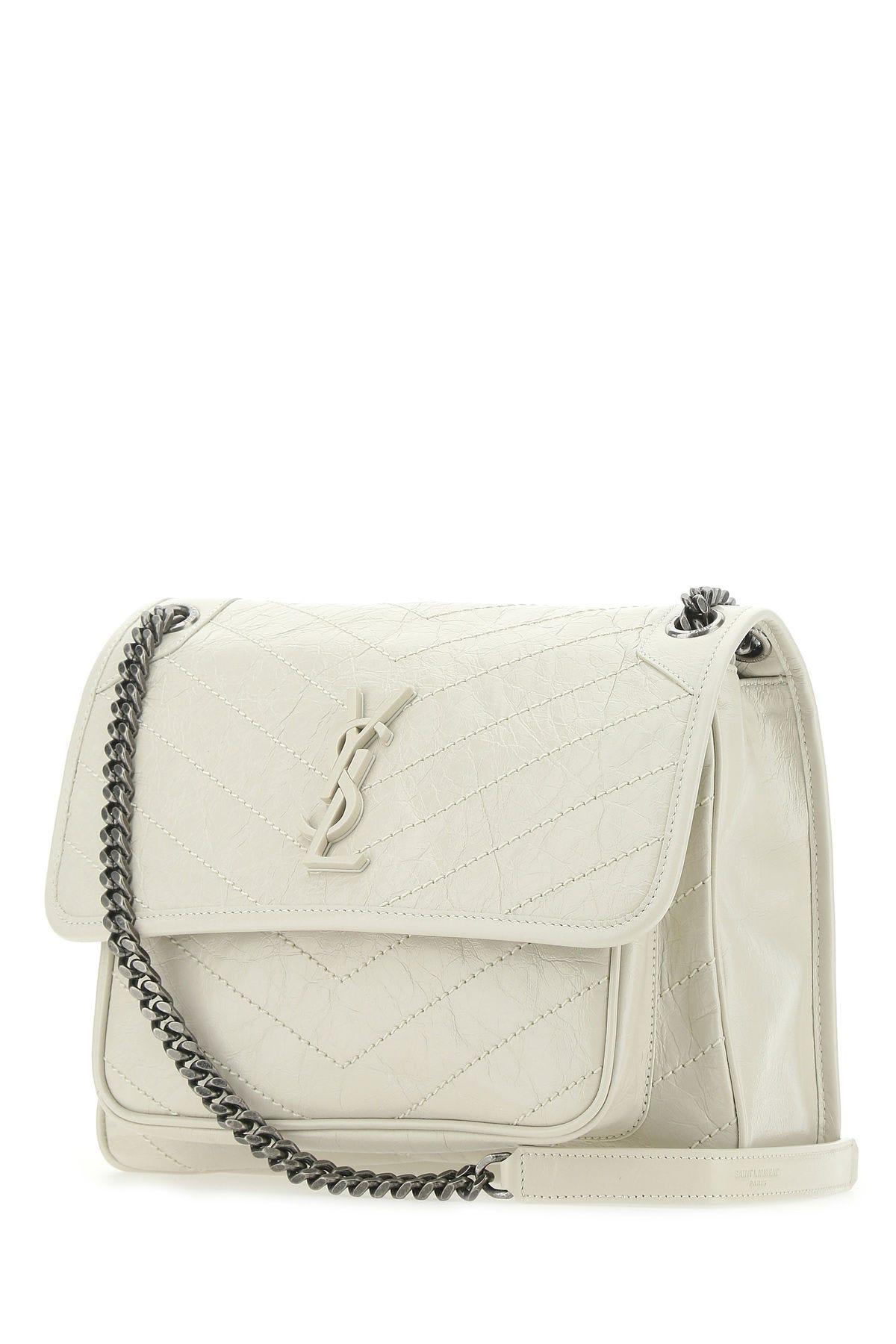 Shop Saint Laurent Ivory Leather Medium Niki Shoulder Bag In White