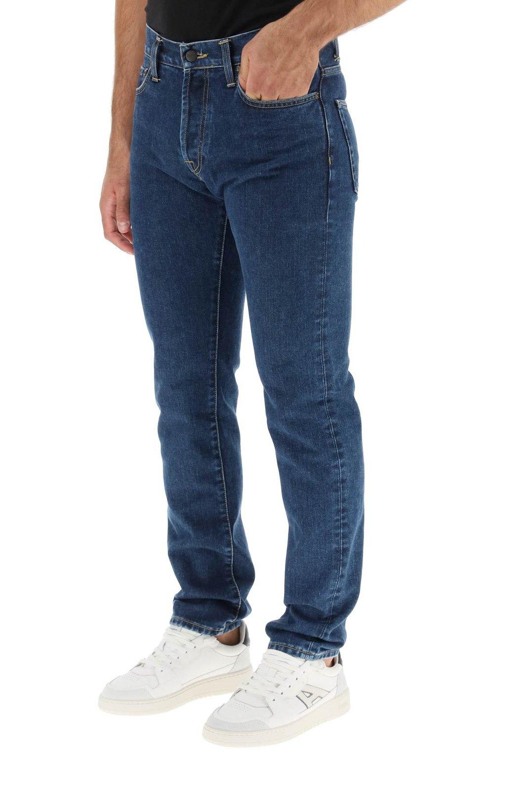 Shop Carhartt Logo Patch Straight Leg Jeans In Blue Stone Washed