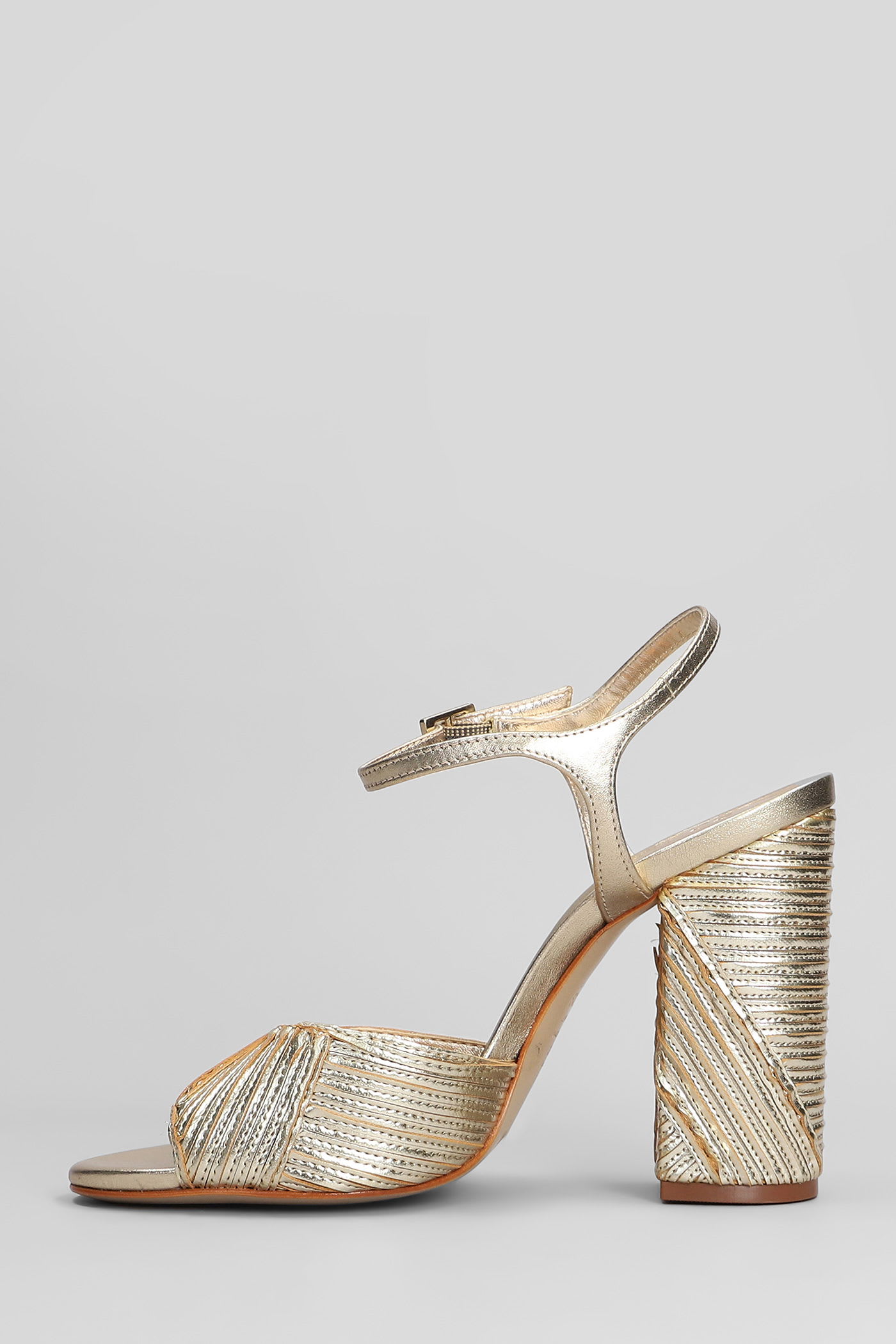 Shop Schutz Lupita Sandals In Gold Leather