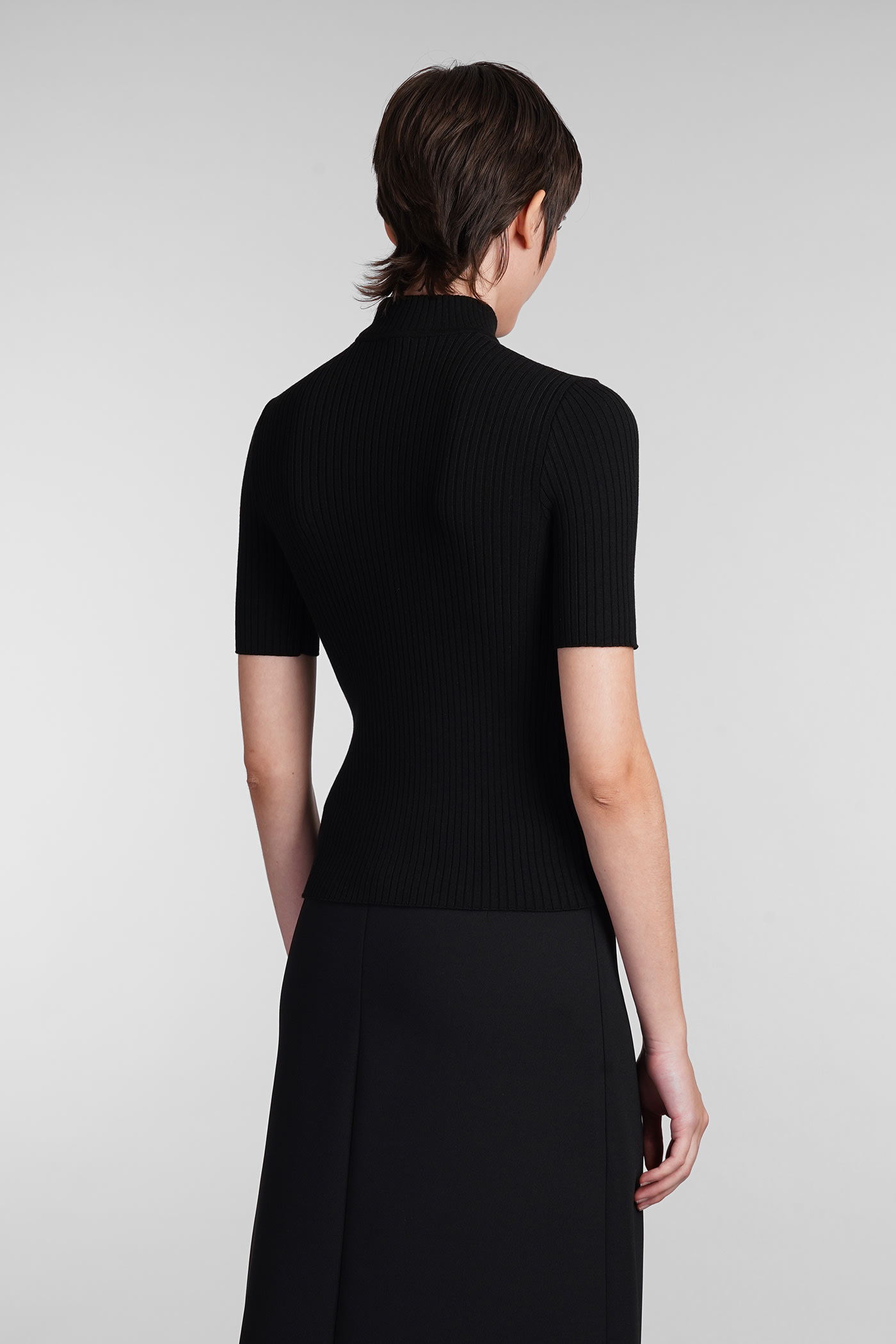 COURRÈGES KNITWEAR IN BLACK VISCOSE 