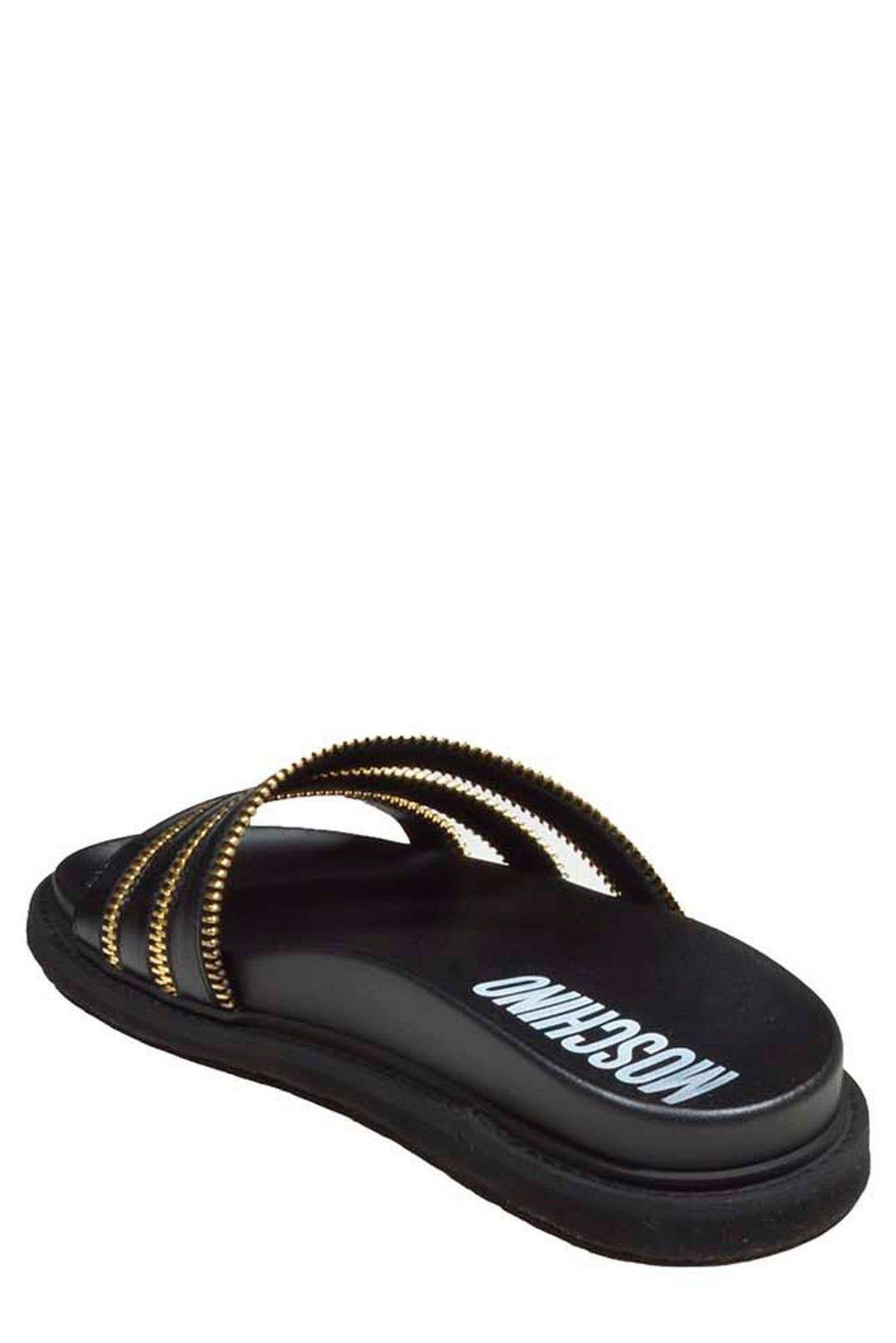 Shop Moschino Zip-detailed Round-toe Slides In Nero