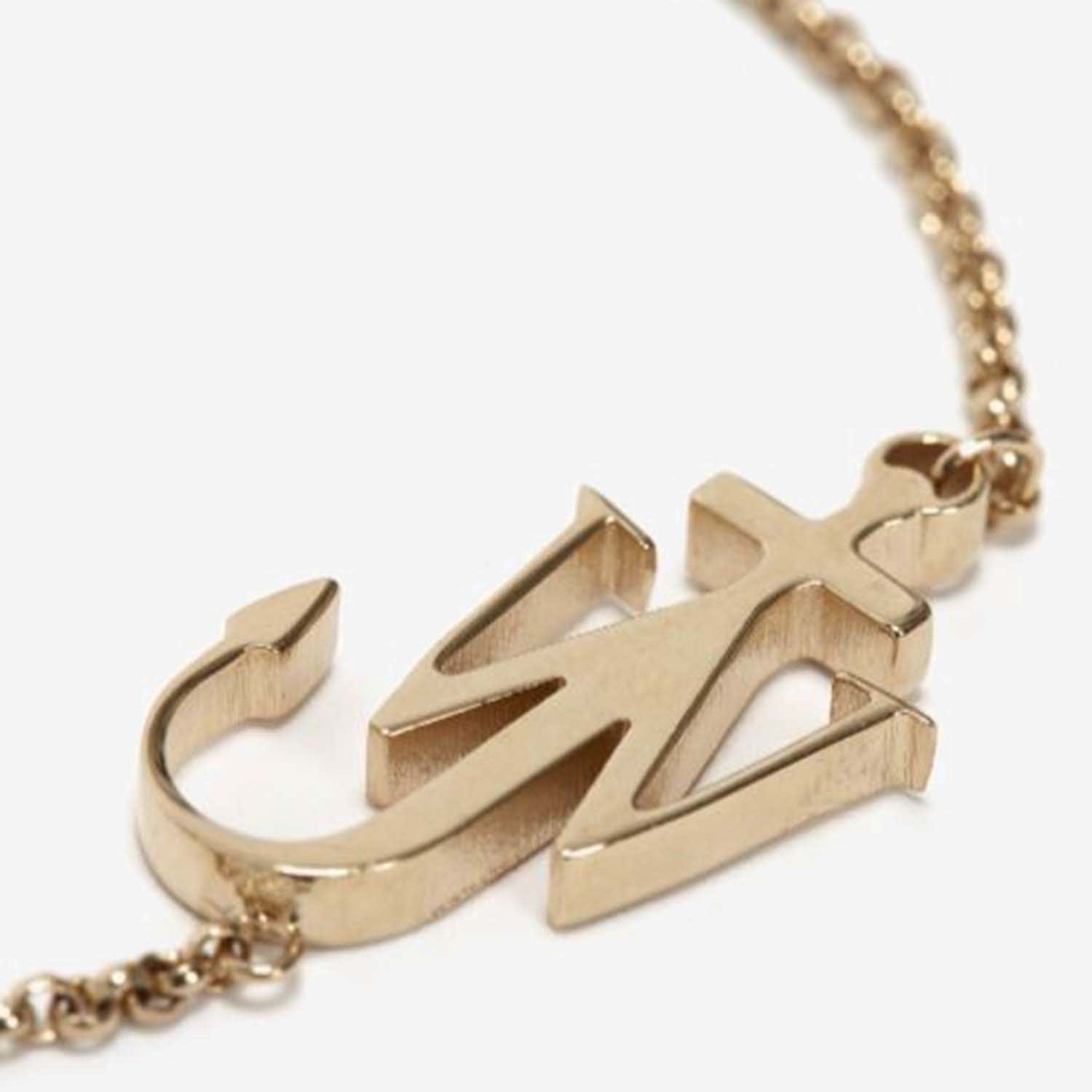 Shop Jw Anderson Brass Logo Bracelet In Golden