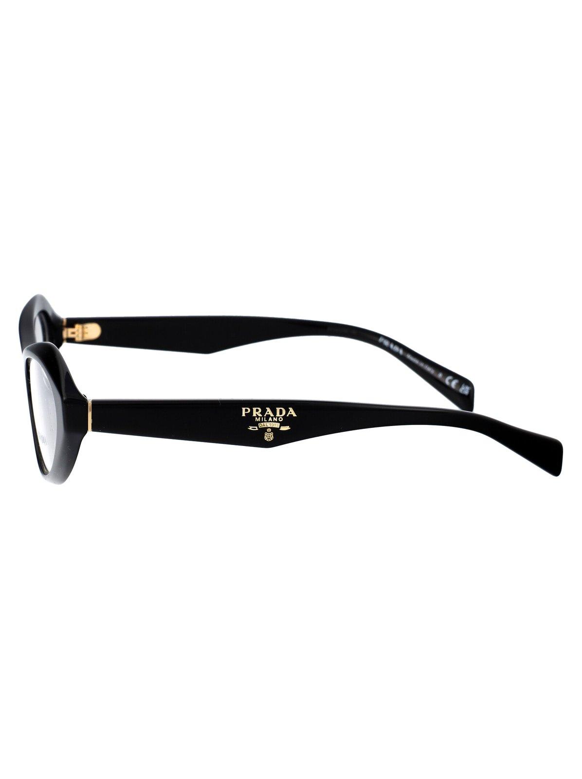 Shop Prada Cat-eye Frame Glasses In 16k1o1