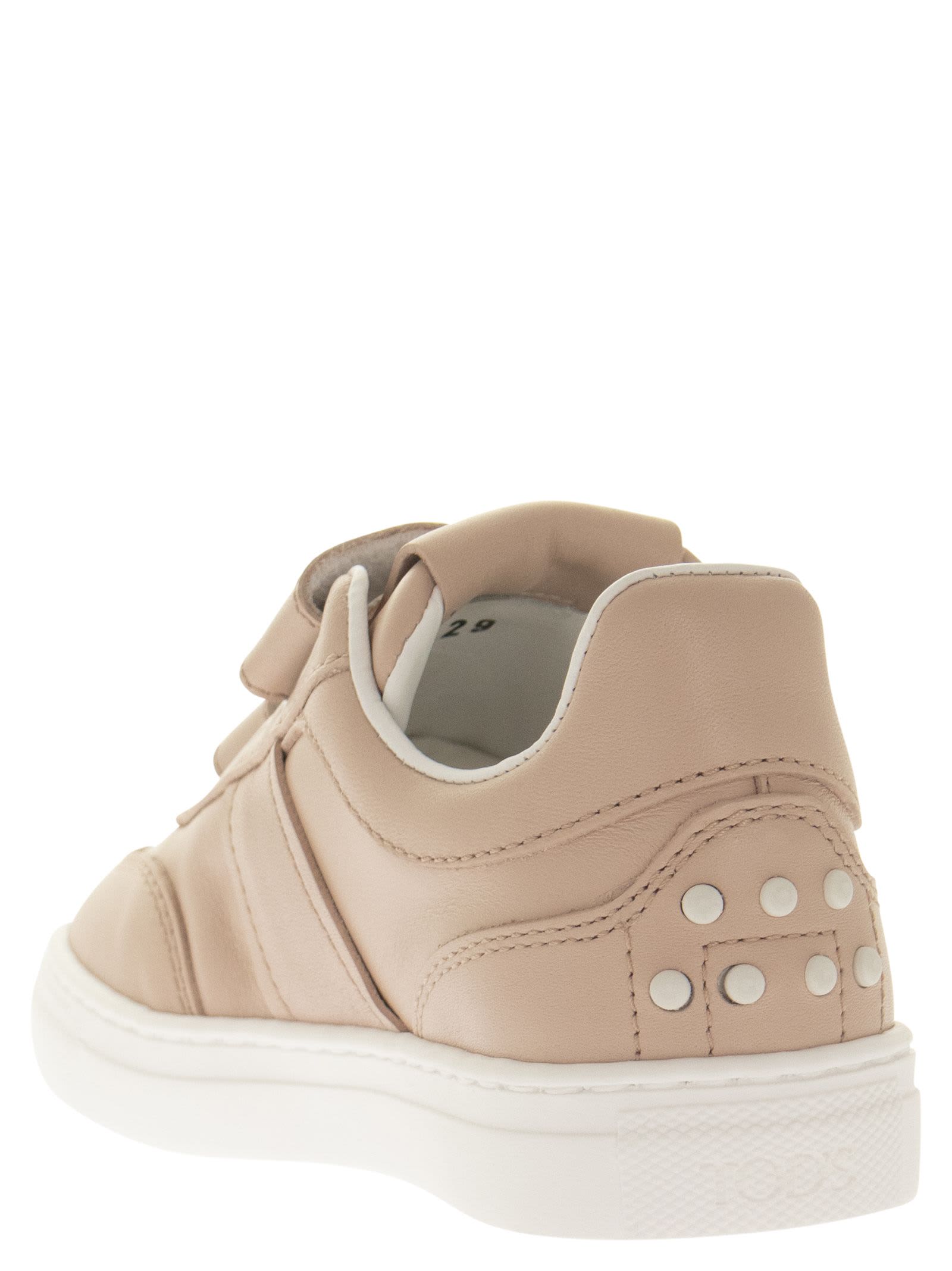Shop Tod's Trainers With Strap Closure In Pink