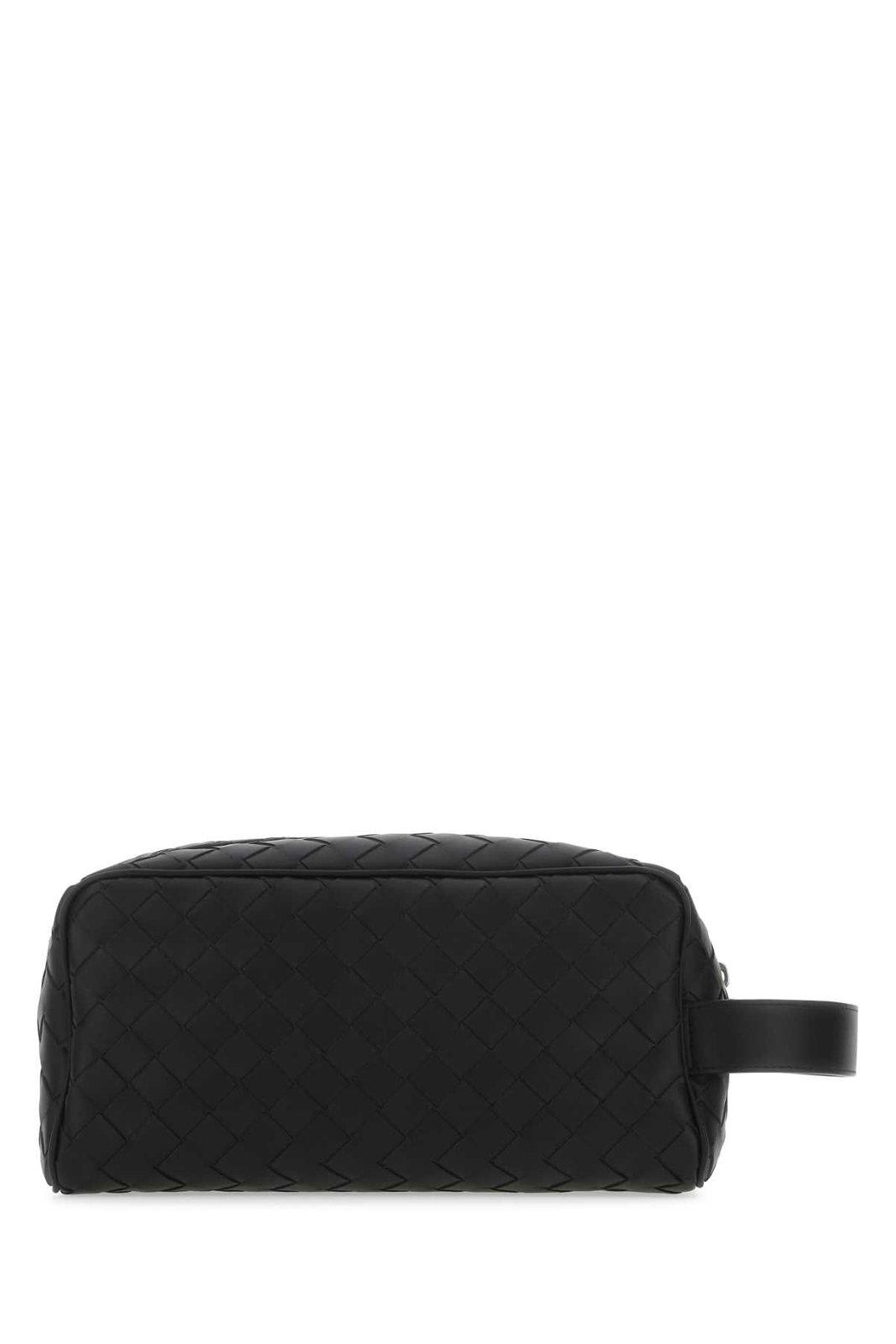 Shop Bottega Veneta Woven Zipped Makeup Bag In Black