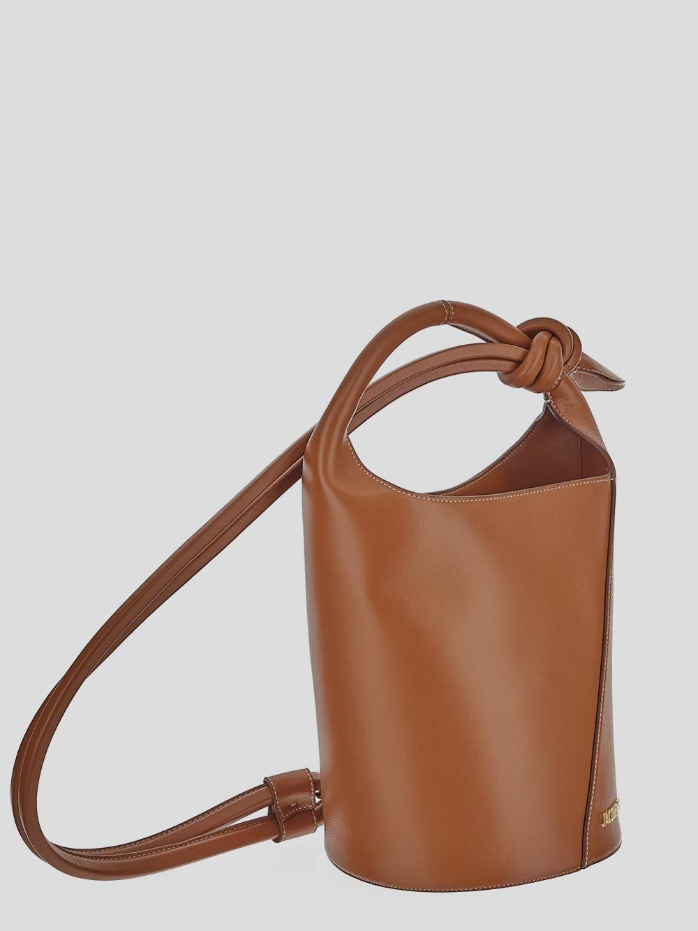 Shop Jacquemus Mini Knotted Bucket Bag In Brown