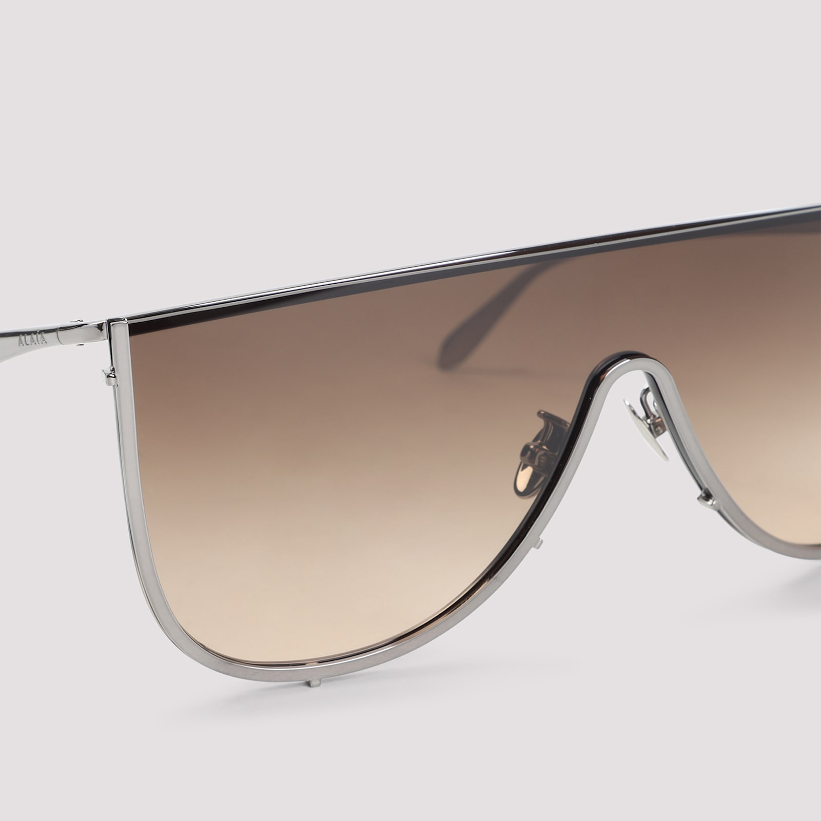 Alaïa Mask Sunglasses Metal Frame Gradient Lenses In Metallic