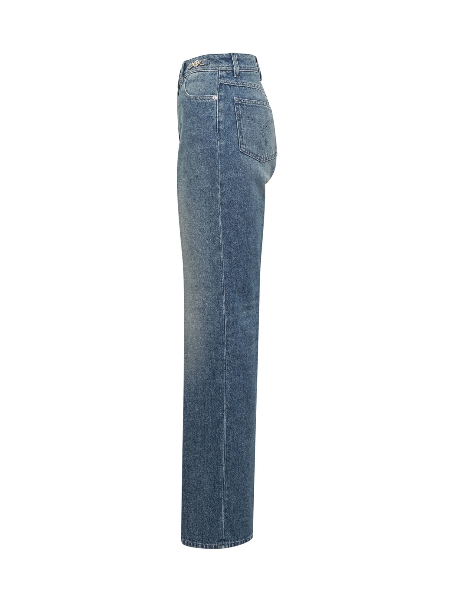 Shop Versace Long Jeans In Denim