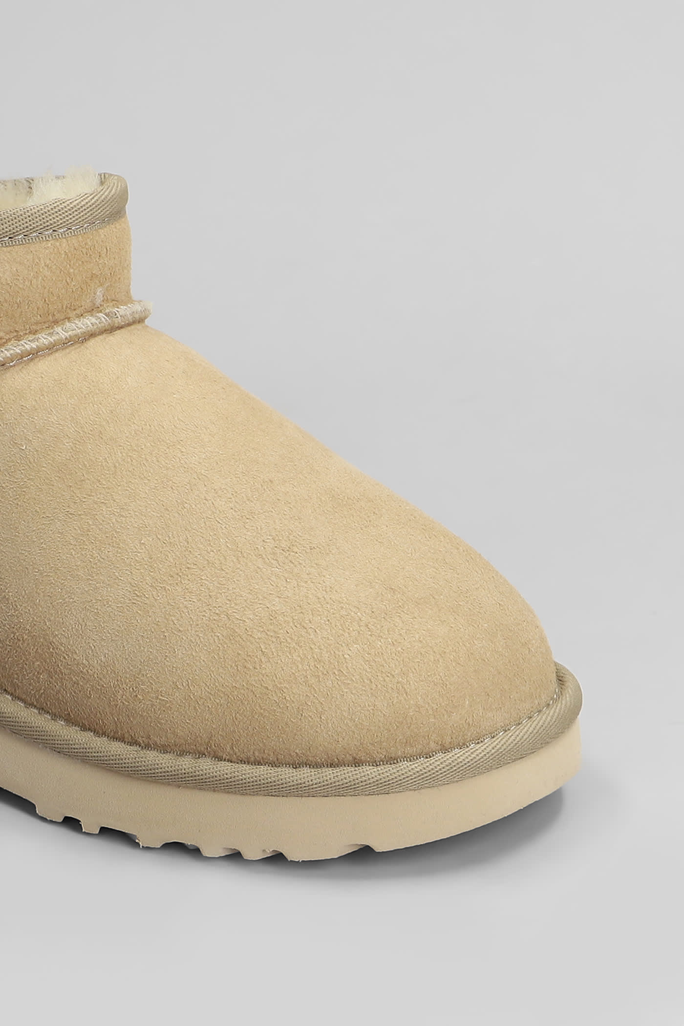 Shop Ugg Classic Ultra Mini Low Heels Ankle Boots In Beige Suede