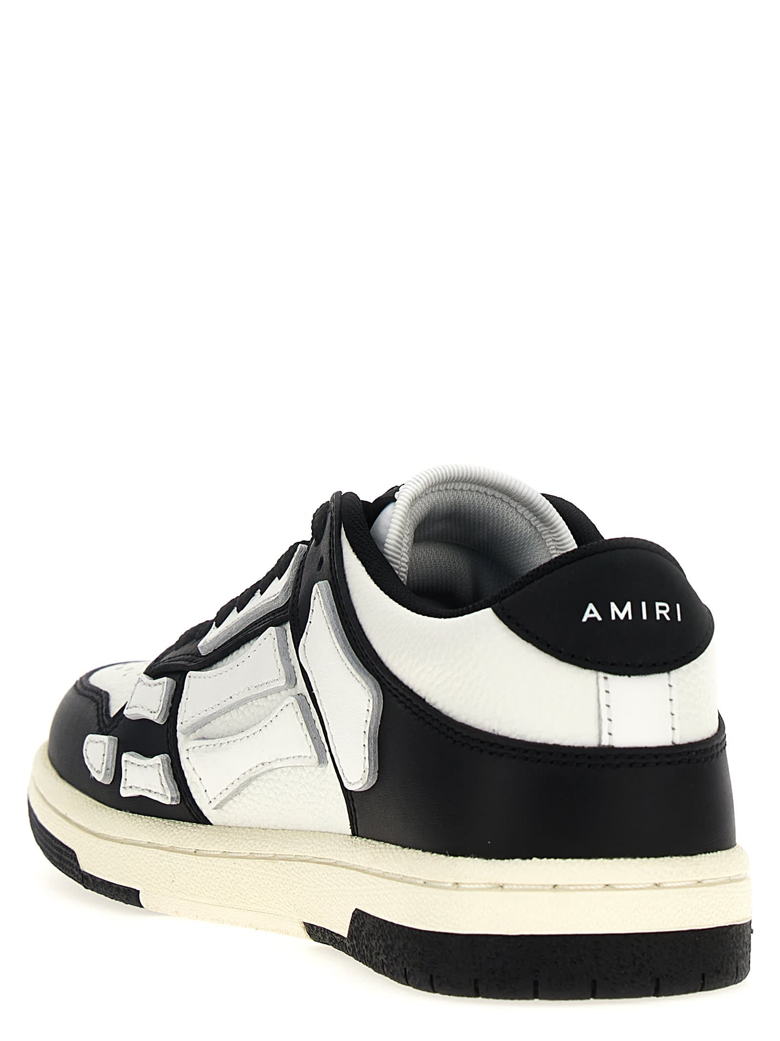 Shop Amiri Skel Top Low Sneakers In White/black