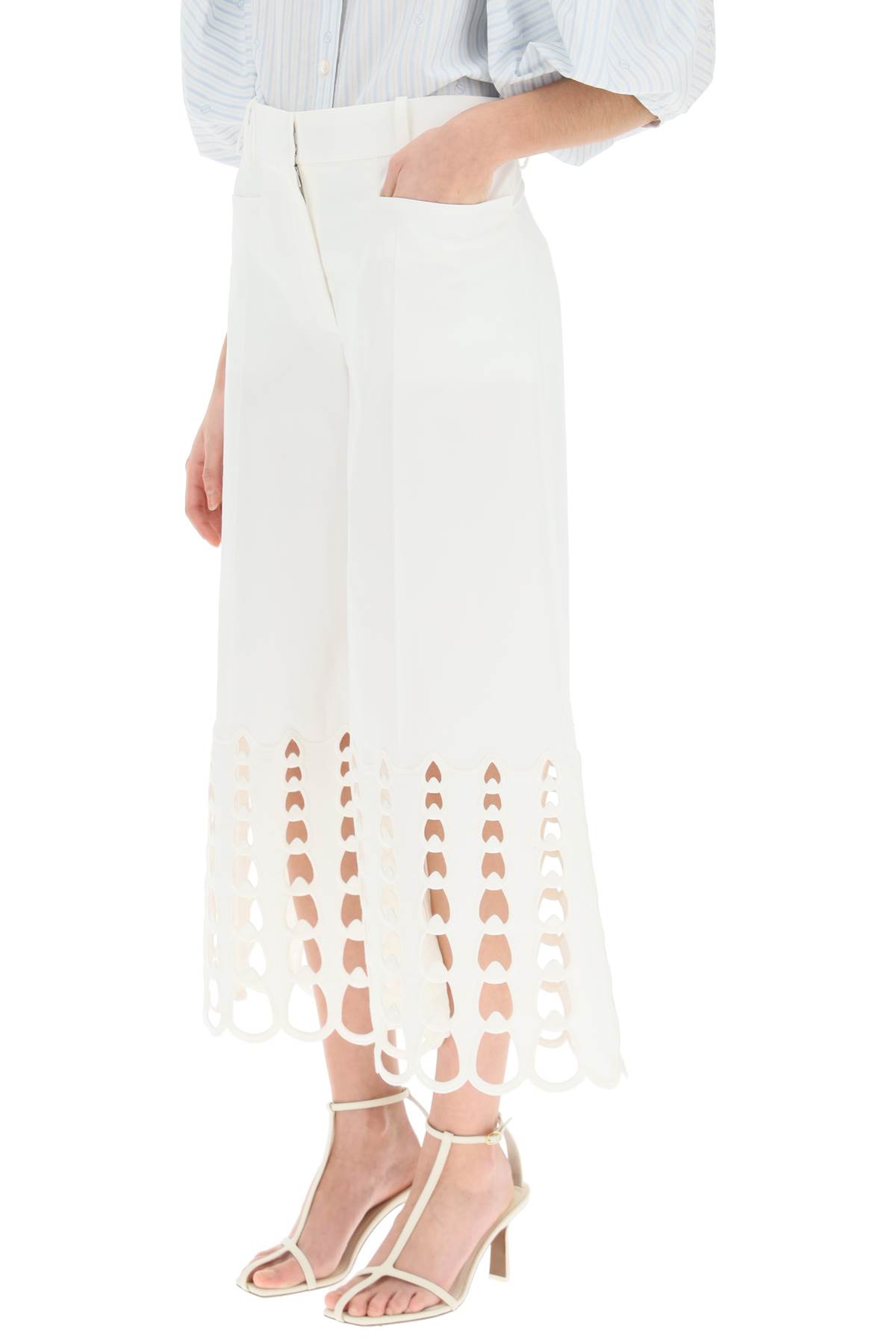 Shop Stella Mccartney Cropped Pants With Embroidered Hem In White (white)