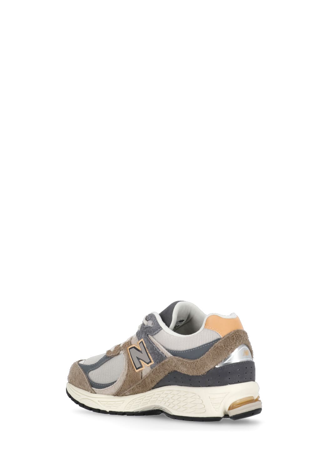 Shop New Balance 2002r Sneakers In Brown