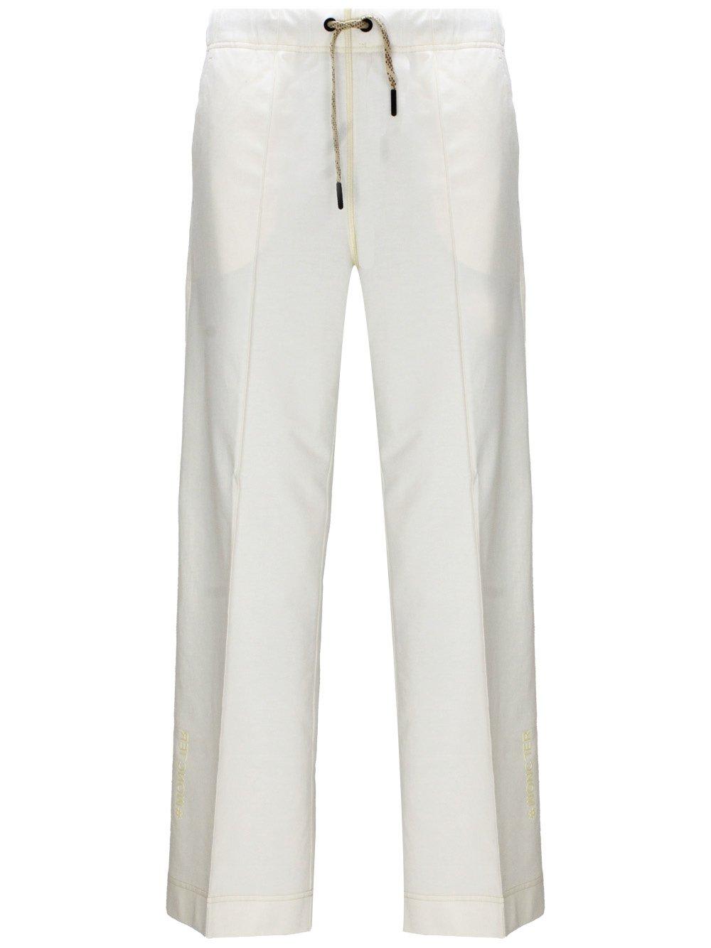 Shop Moncler Logo Embroidered Drawstring Pants In White