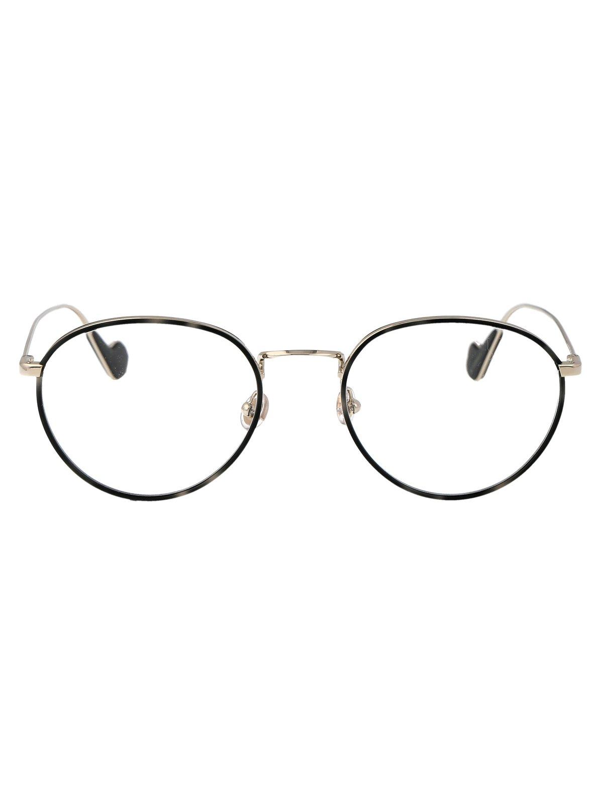 Shop Moncler Oval Frame Glasses In 032