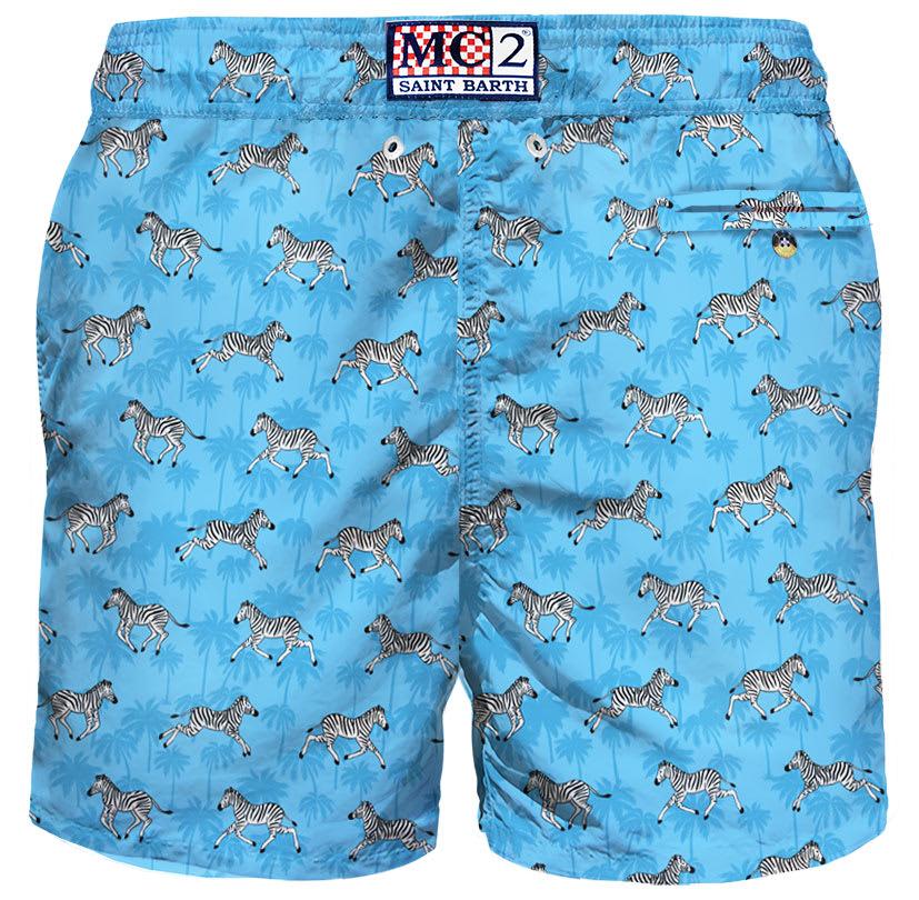 Mc2 Saint Barth Man Light Fabric Swim Shorts With Zebra Print In Blue