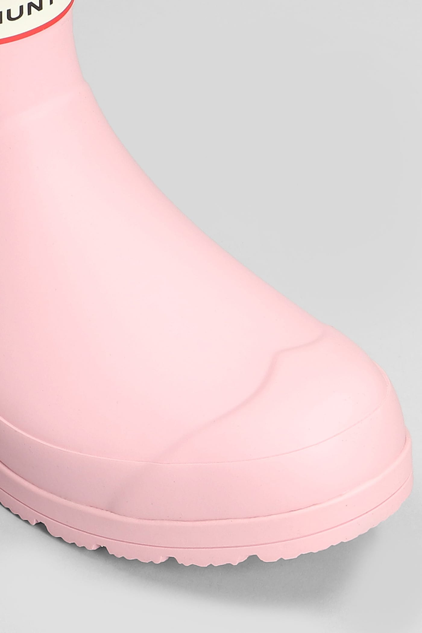 Shop Hunter Play Boot Short Low Heels Ankle Boots In Rose-pink Rubber/plasic